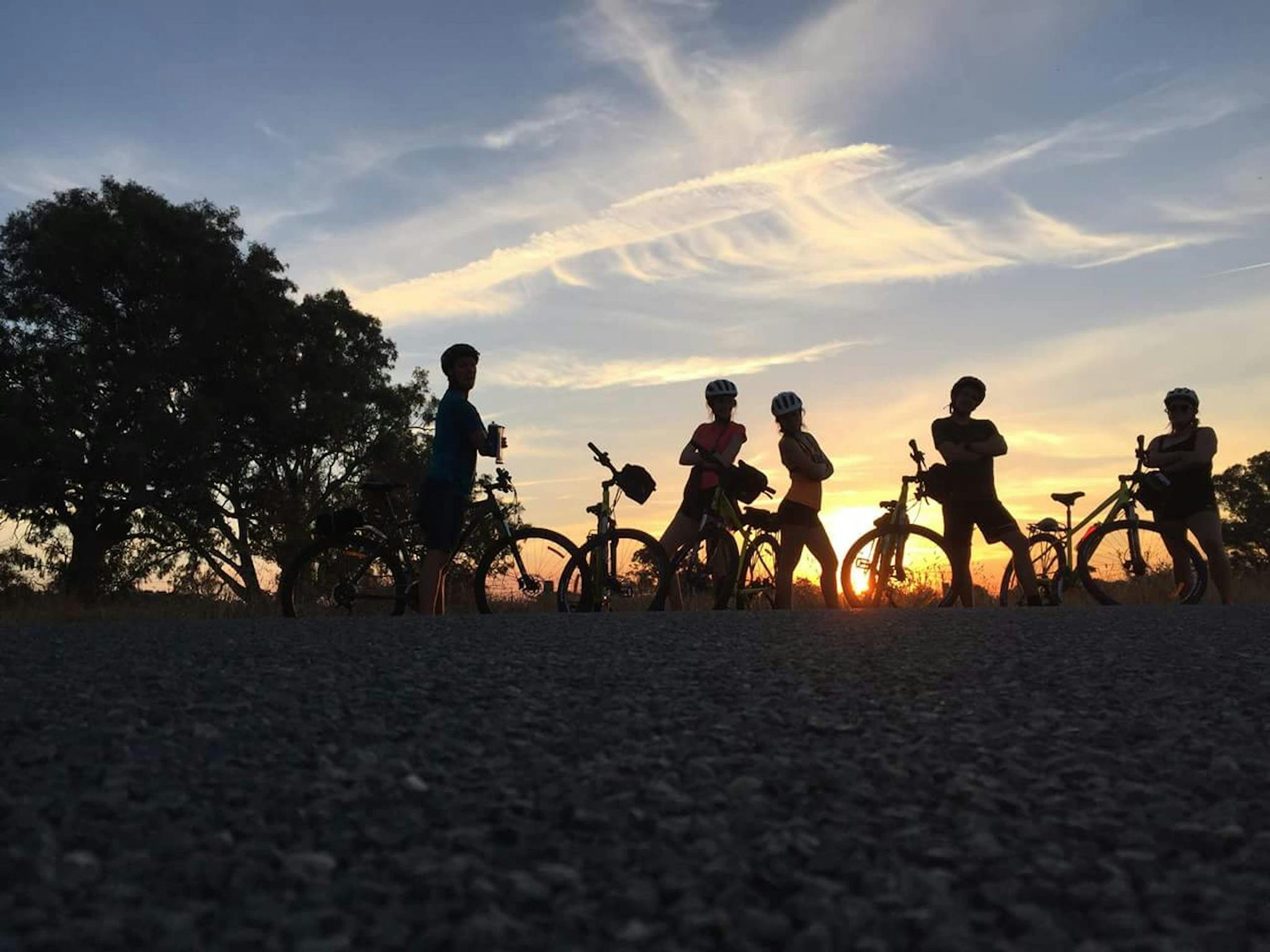 Cycle Tour riders Sunset on  Murray to Mountains Rail Trail