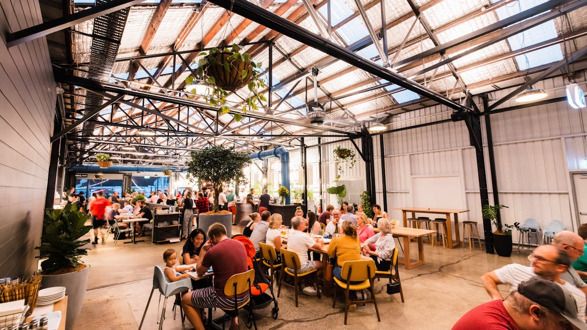 Image of seated indoor dining area at Slipstream Brewing