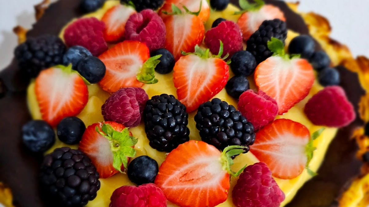 Basque with mixed berries on top