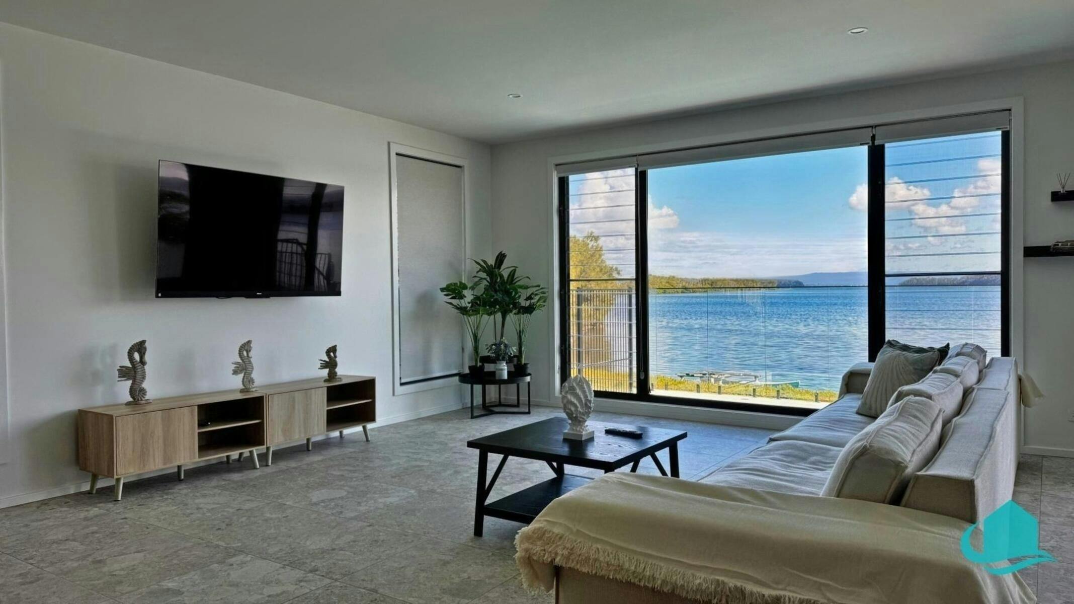 Lounge room with wall mounted TV