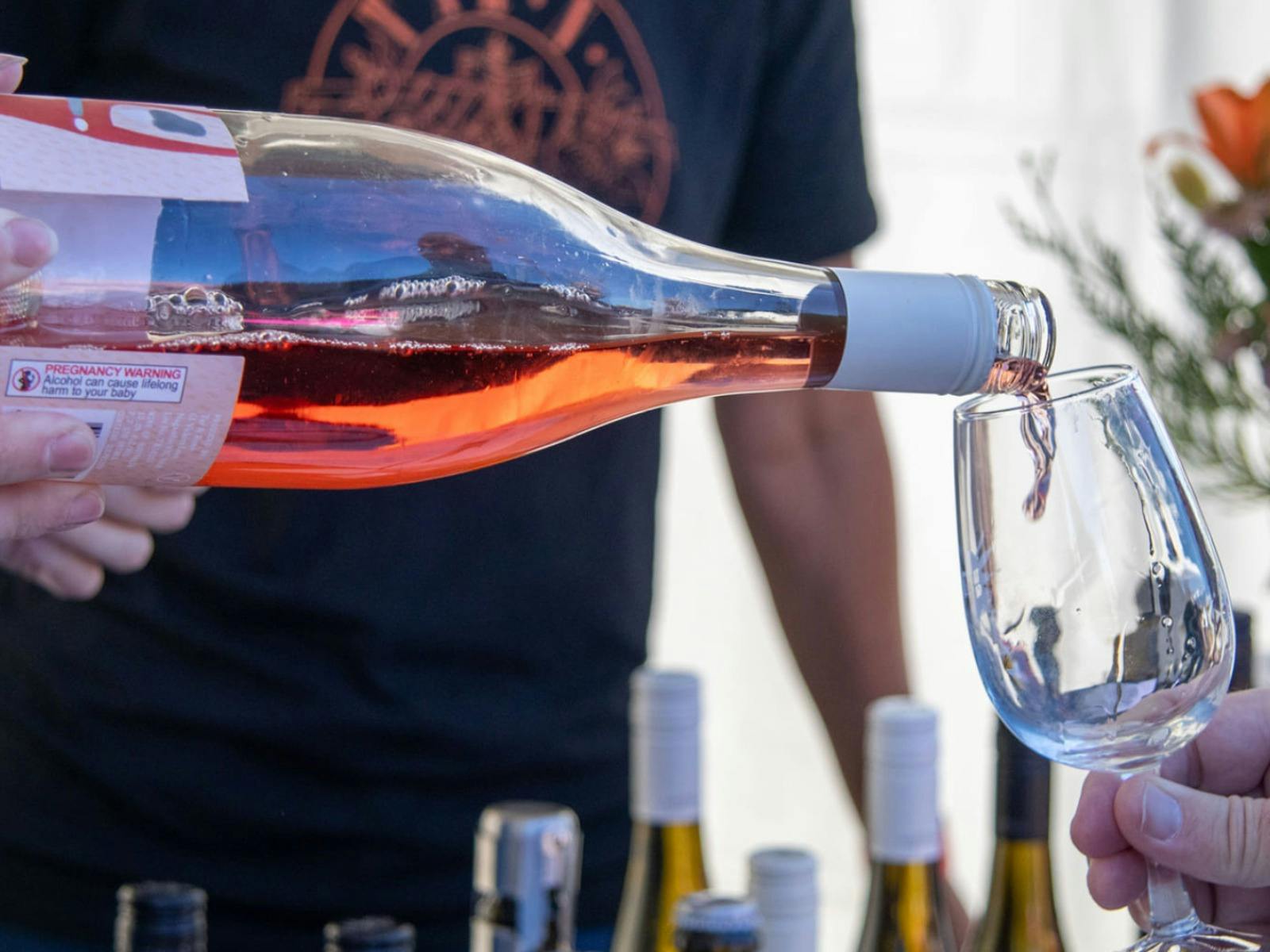 wine being poured into a glass