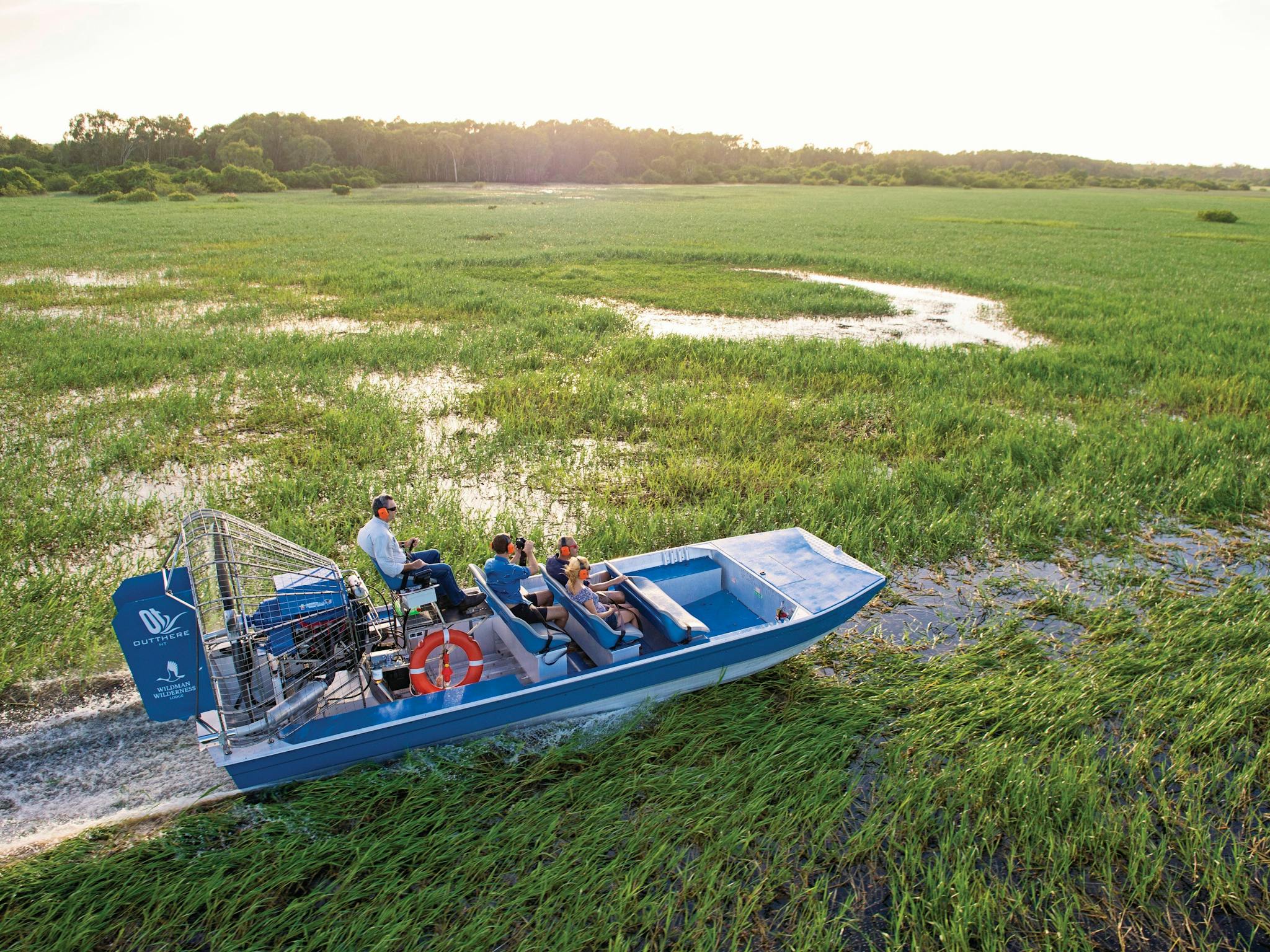 People air boating down Mary River National Park