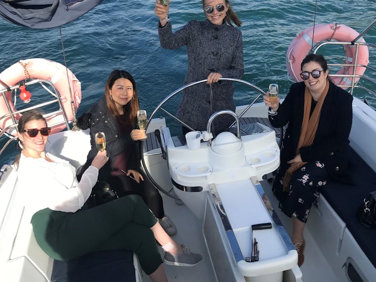Group having a drink on a Yacht