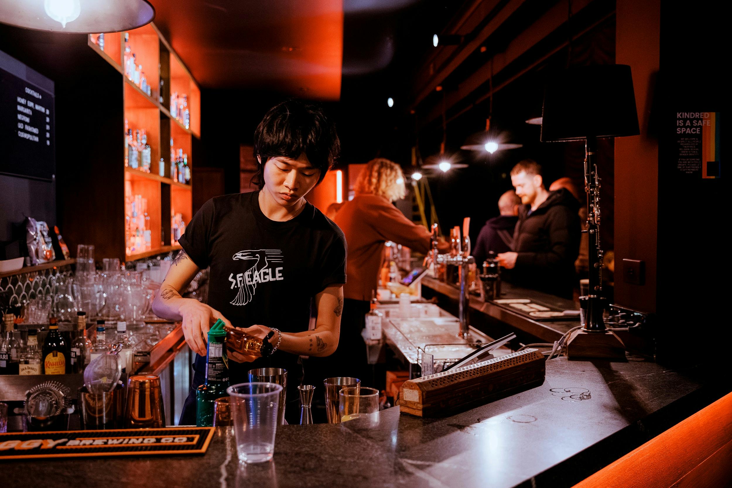 Ben La from Peach Puzz working the bar at Kindred Bandroom