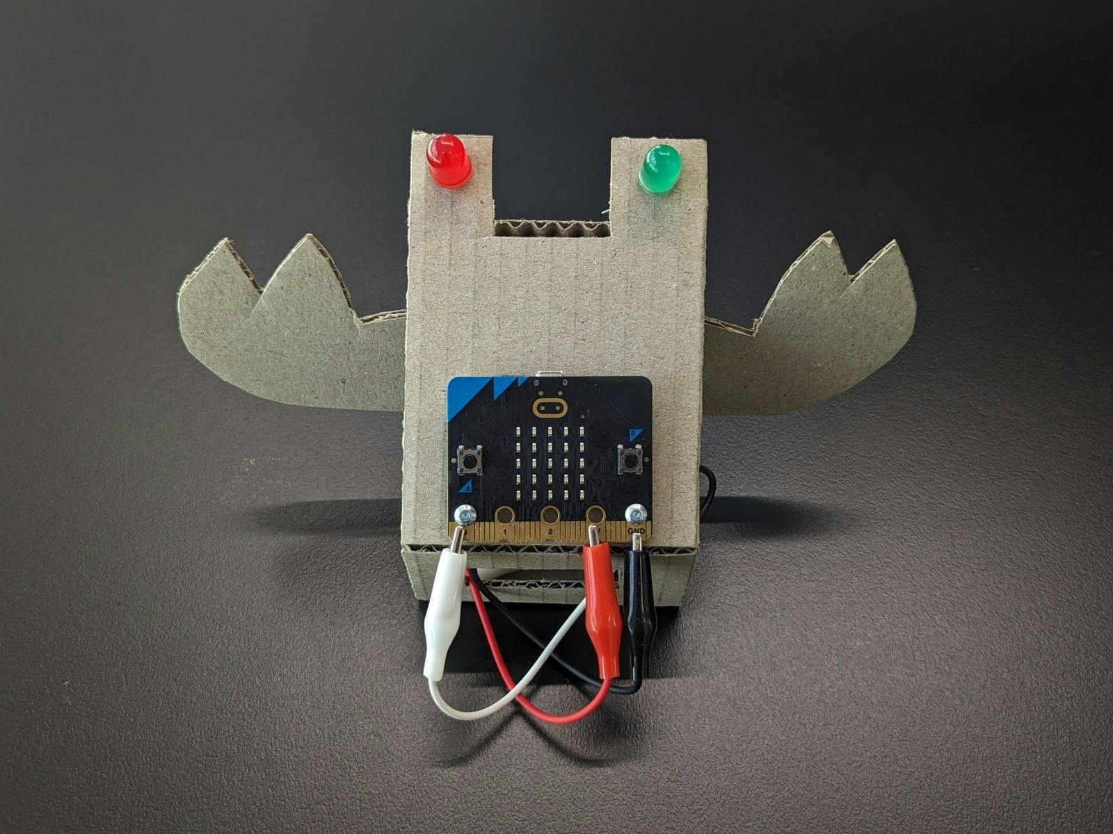 A crab-shaped cardboard robot