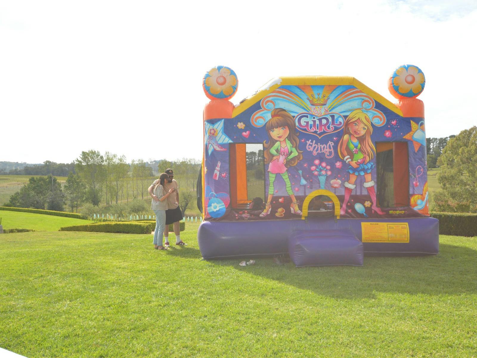 Large jumping castle on a sunny day at Stockman's Ridge Wines