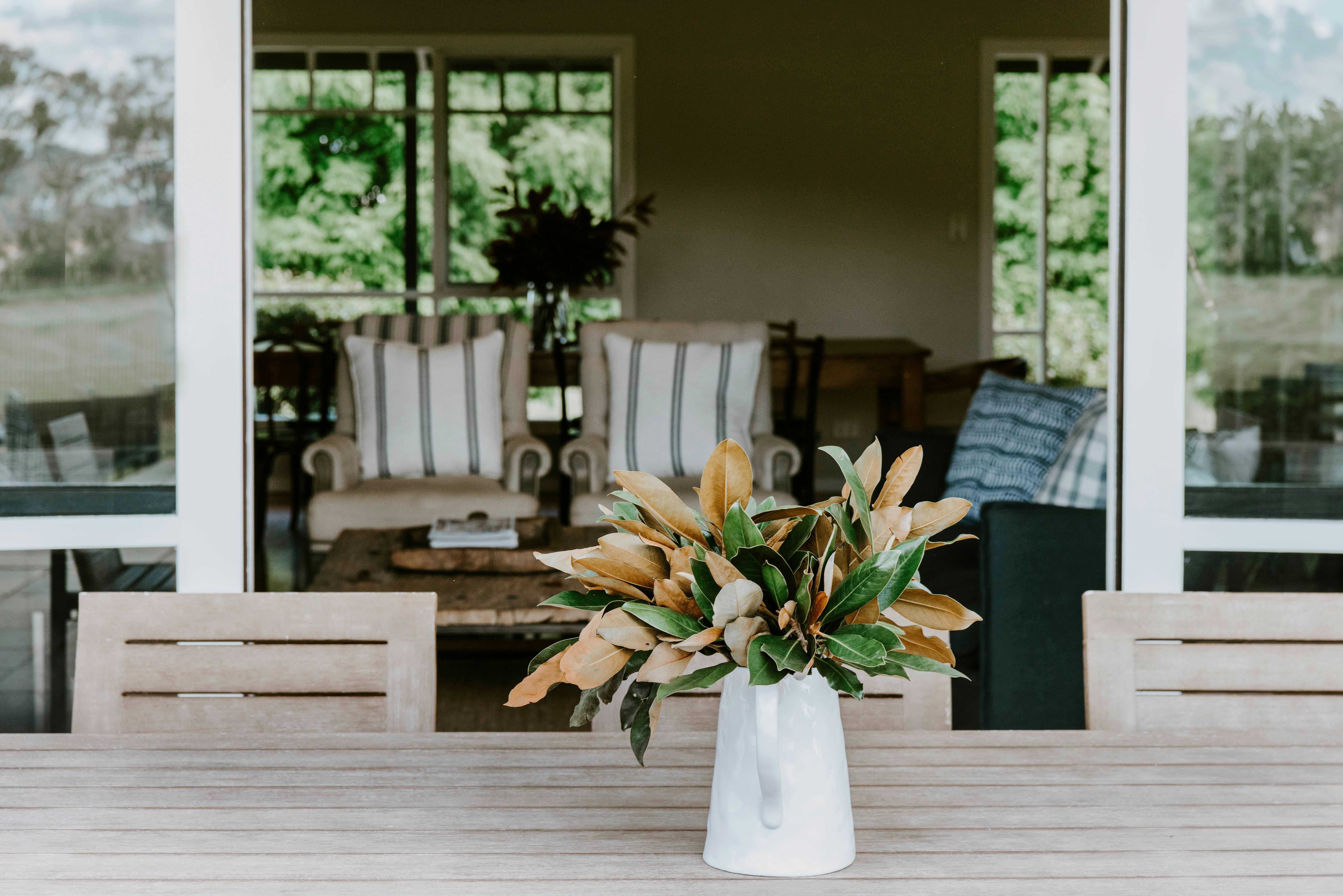Outdoor dining area looking into the main living area of The Farmhouse, Blue Wren Farm, Mudgee.