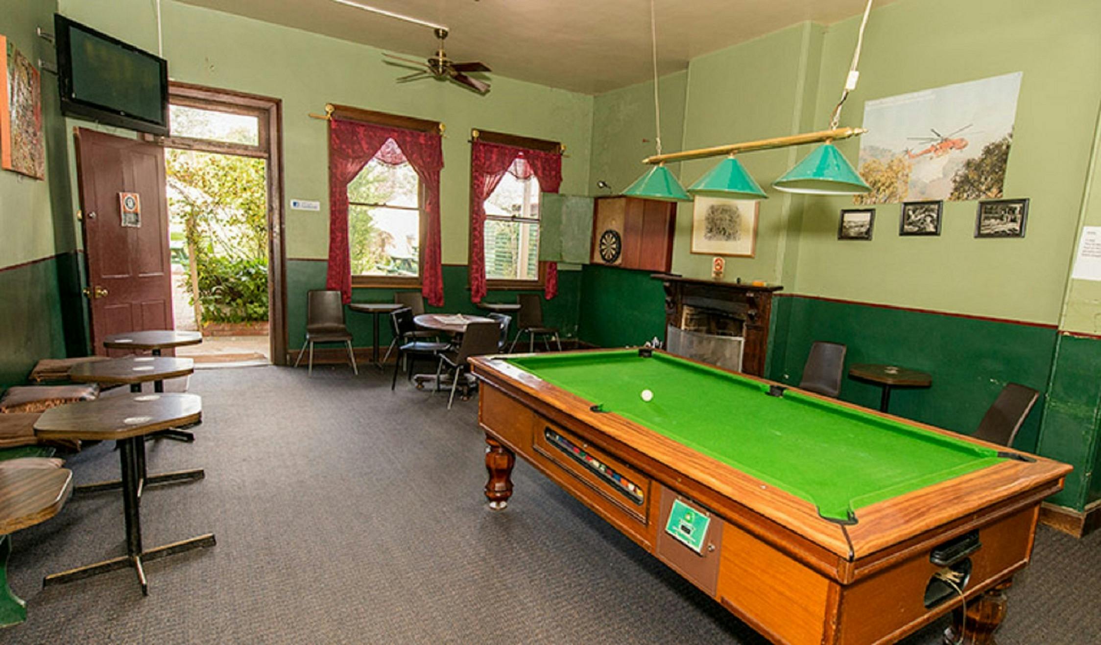 Pool Table, red curtains