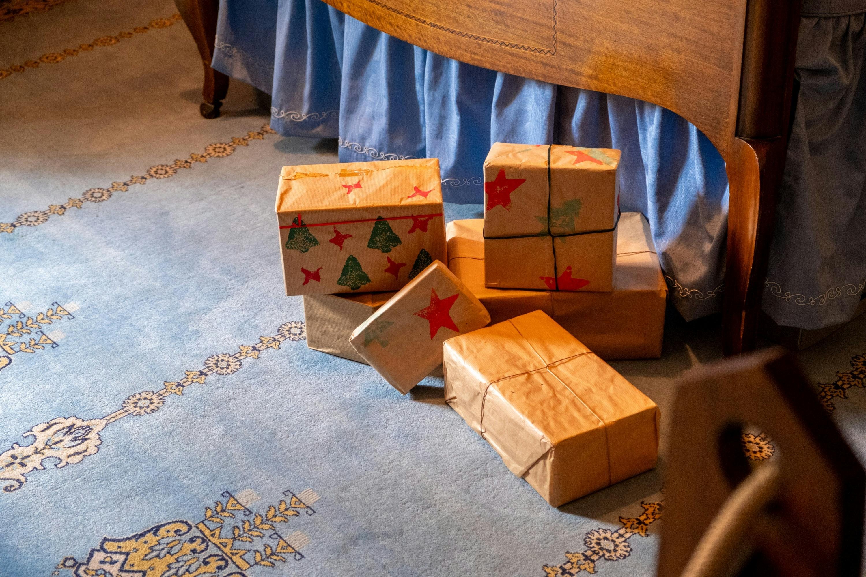 Christmas presents at foot of bed at Calthorpes House