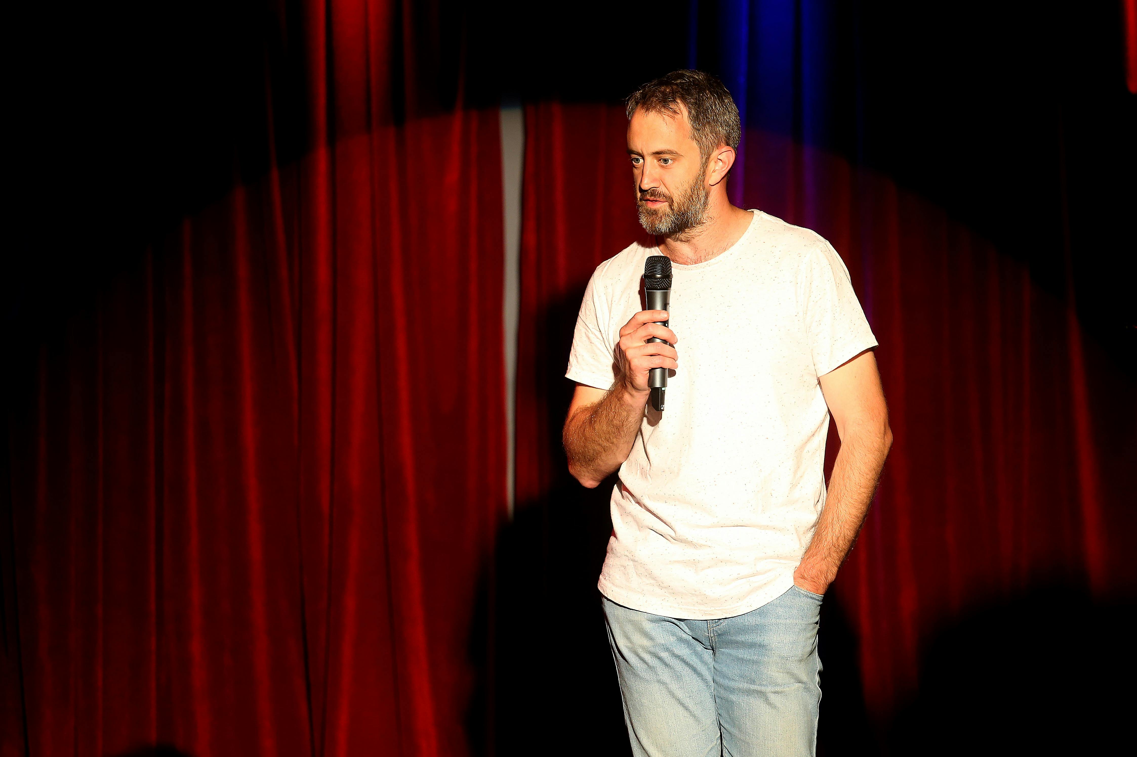 comedian with mic