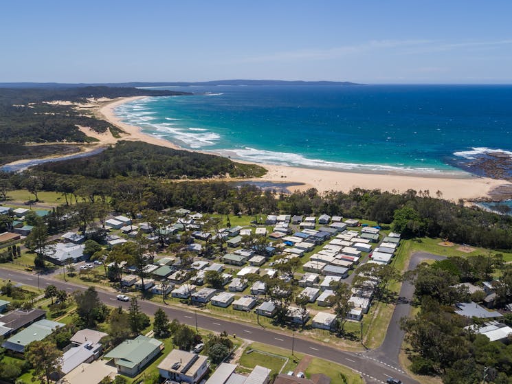 Aerial photo of Surfside Cudmirrah Beach looking north. We offer direct access to the beach.