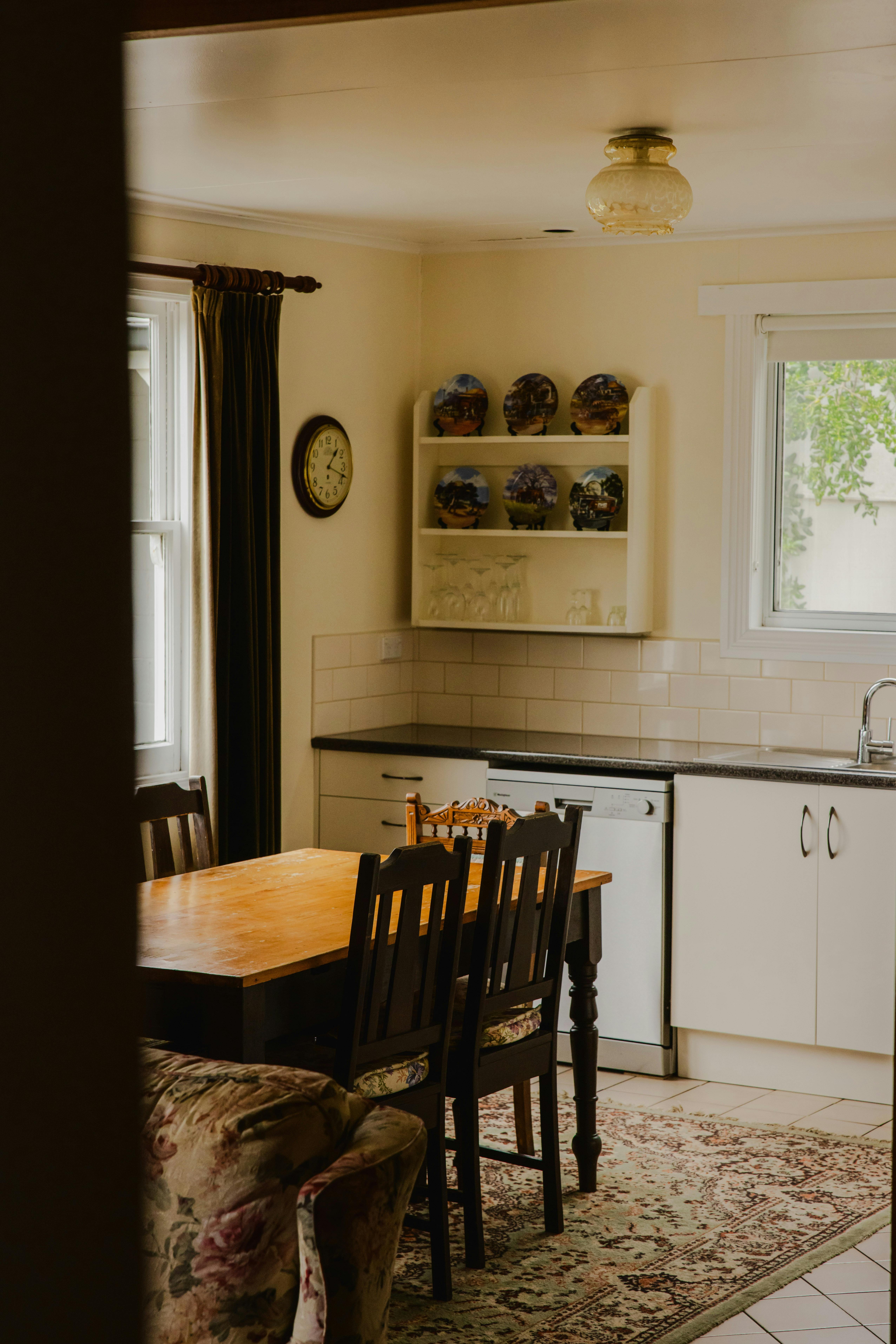 Kitchen with dishwasher, full stove and oven, large refrigerator, all utensils