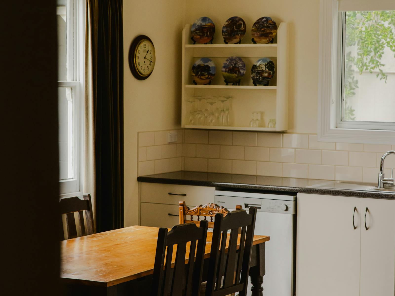 Kitchen with dishwasher, full stove and oven, large refrigerator, all utensils