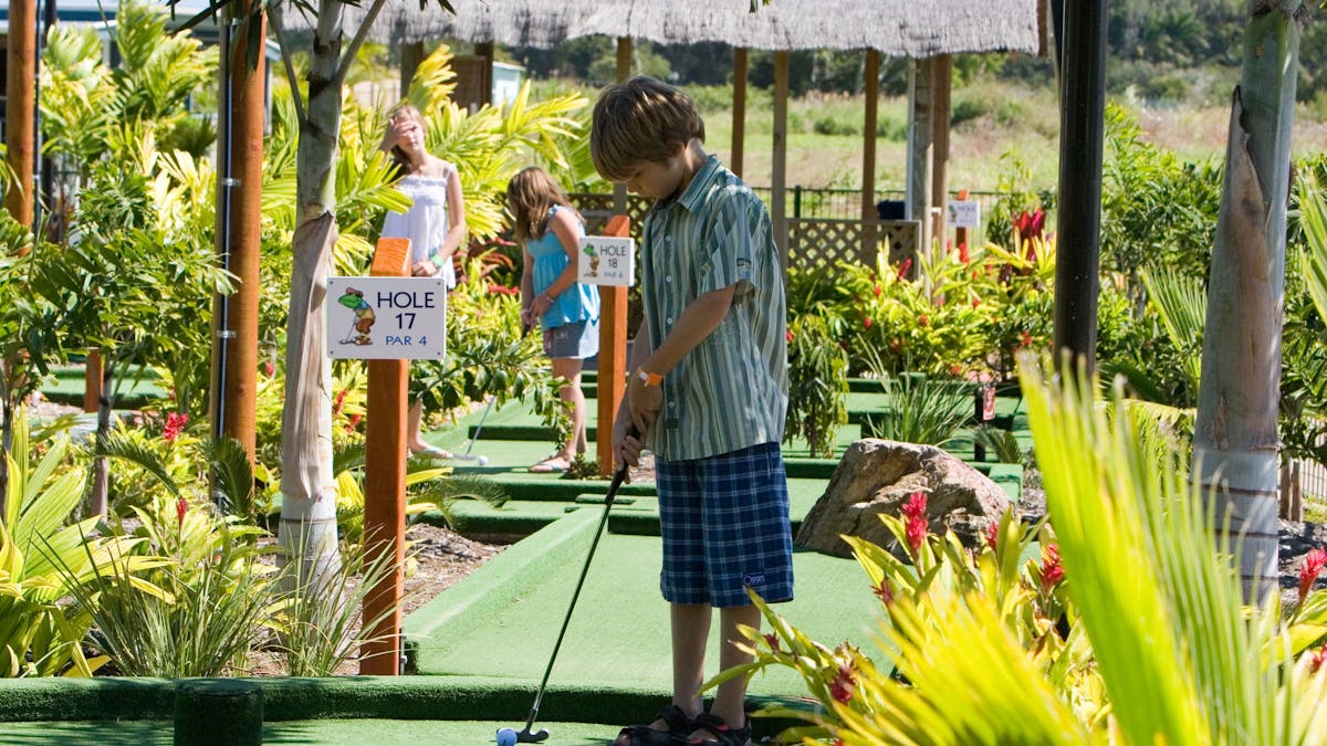 Children playing 19 hole mini golf at BIG4 Adventure Whitsunday Resort