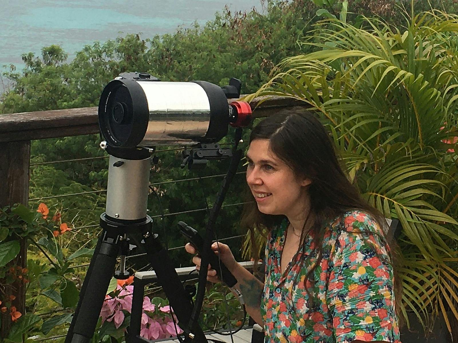 Dr Karelle Siellez is operating an outdoor telescope