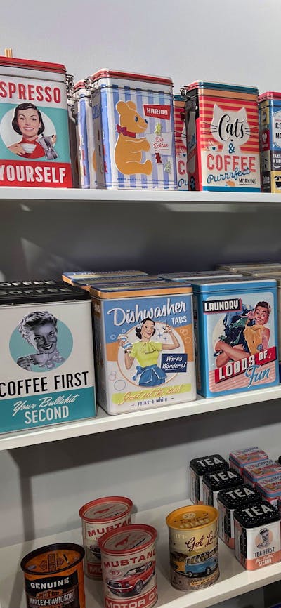 Retro tins and kitchen storage add nostalgic style to Pom Pom Store.