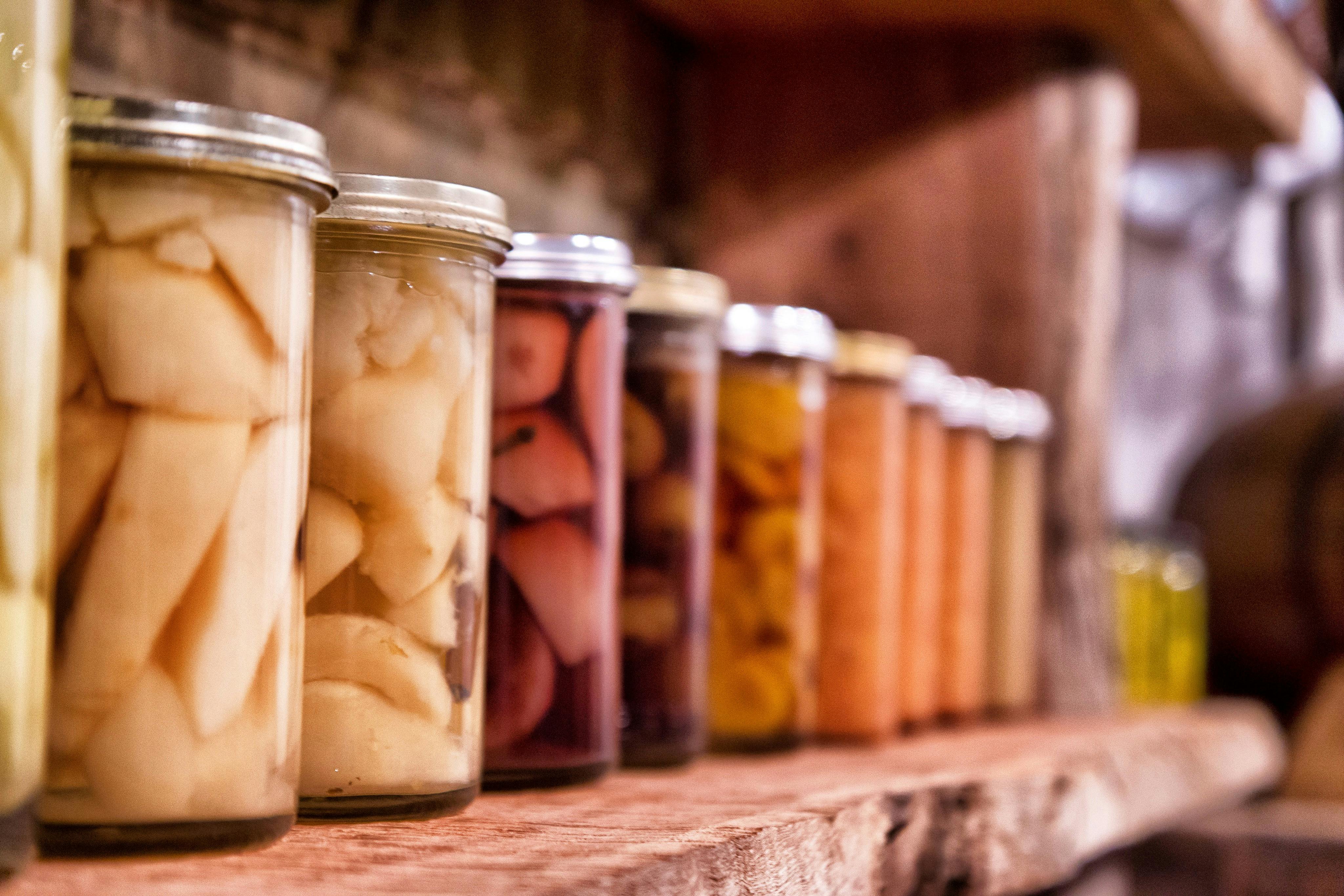 Home produce on the red gum shelving in our restored cellar
