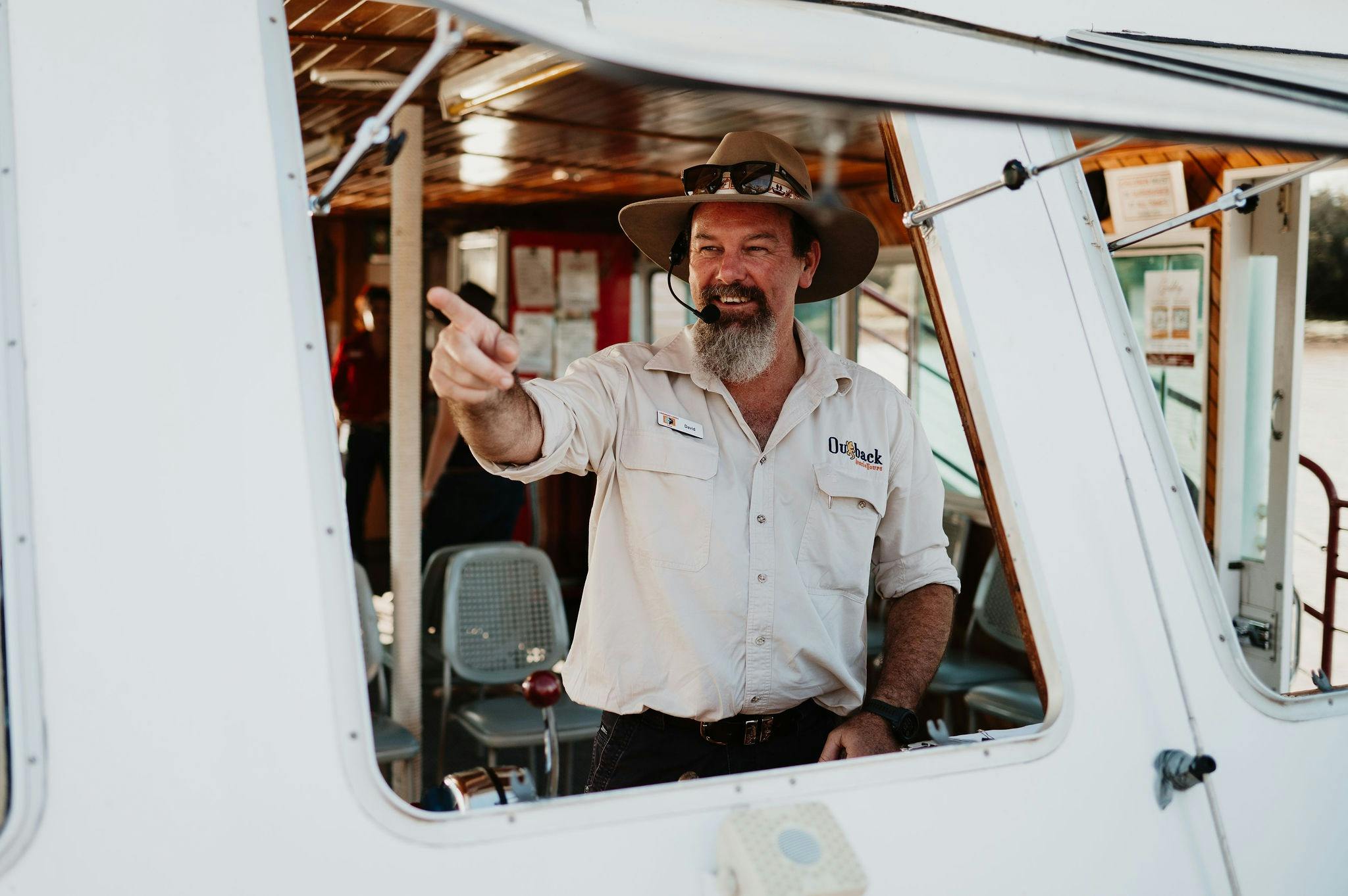 Cruise skipper pointing out the sights