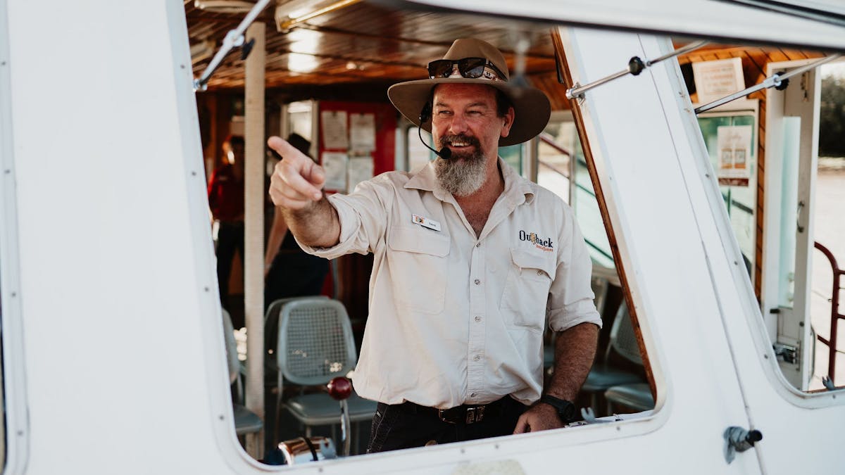 Cruise skipper pointing out the sights