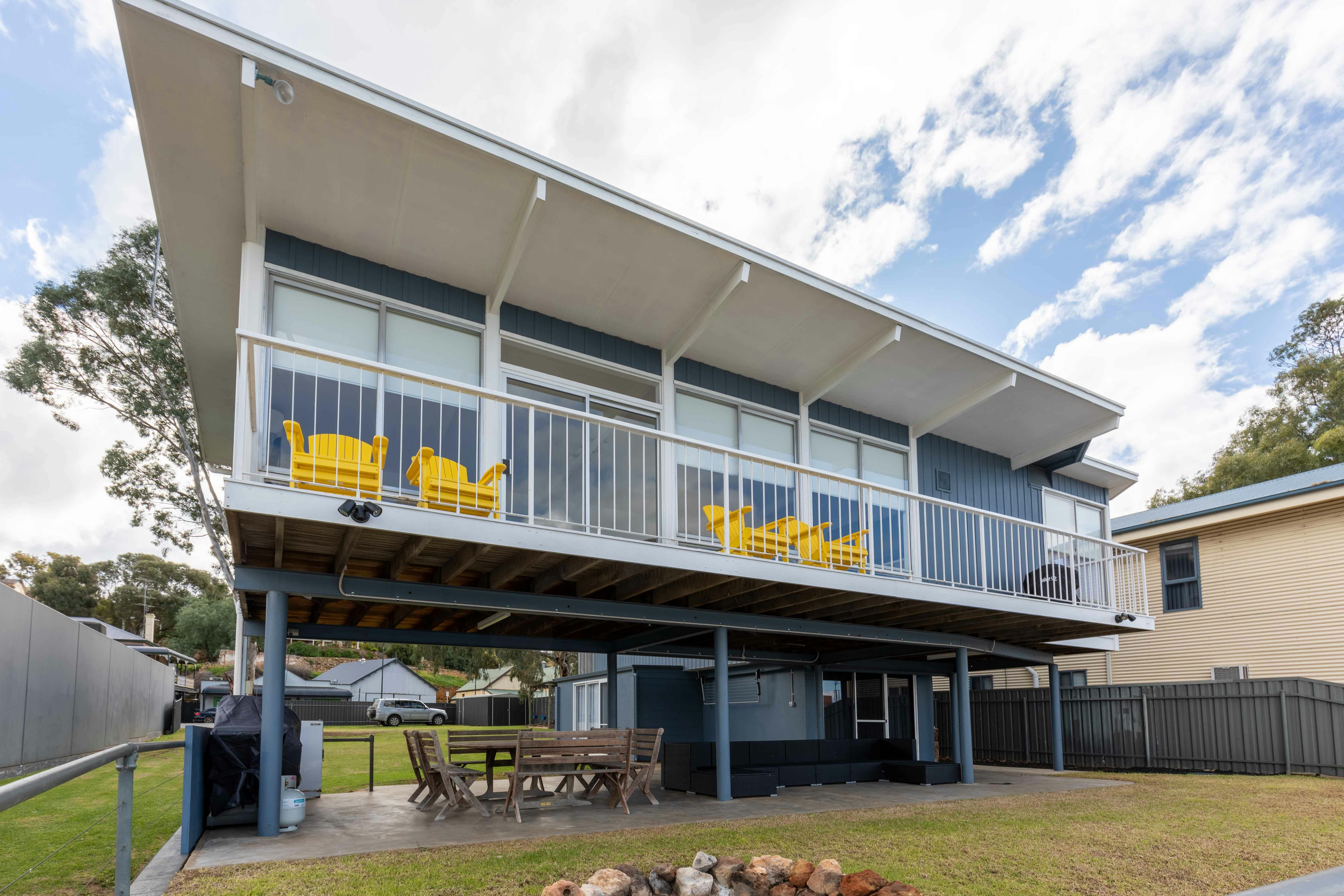 up stairs decking and under cover BBQ area
