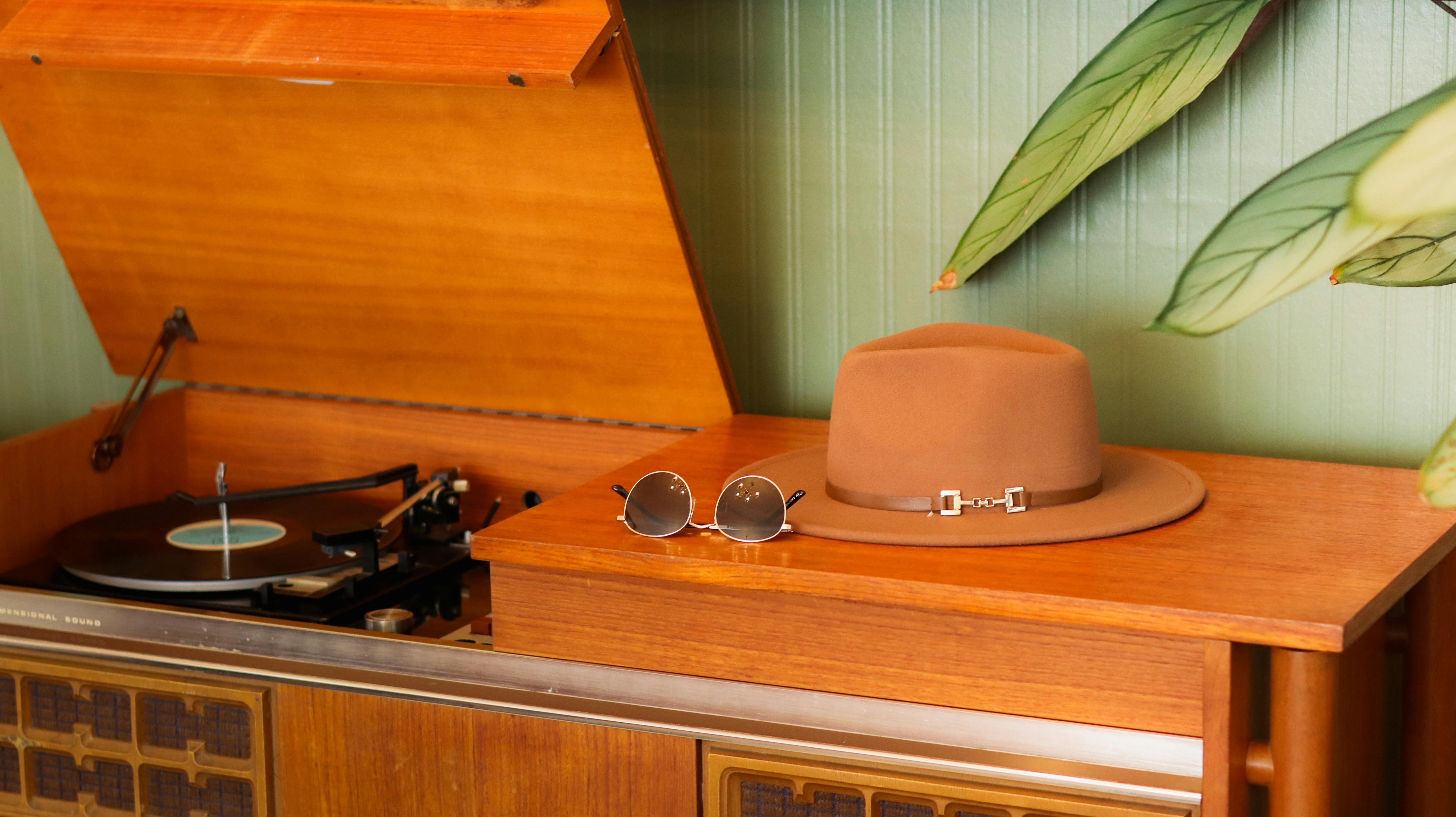 Vintage record player with selection of vinyl records to enjoy