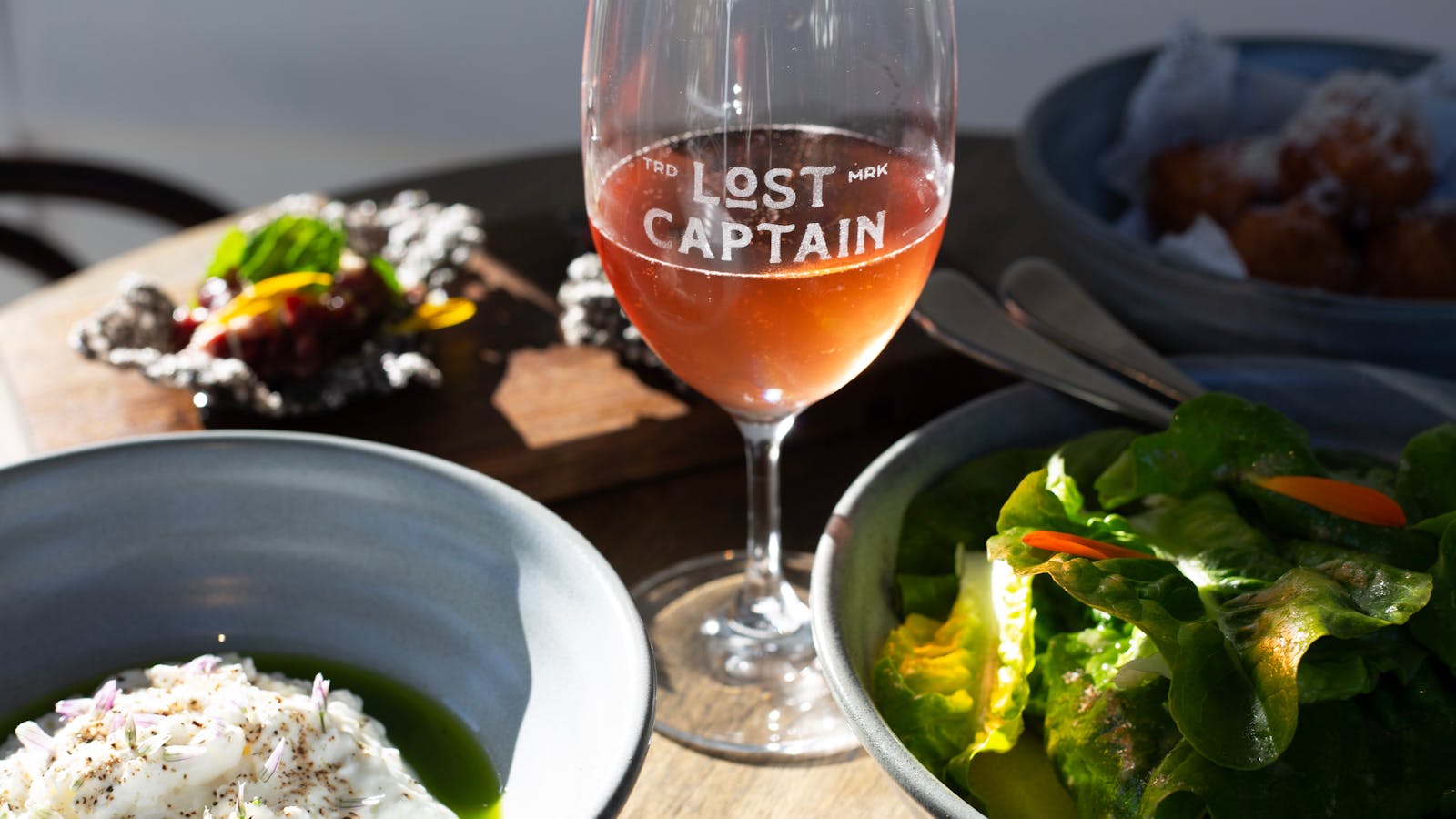 The freshest locally grown food and wine such as these beautiful greens from Gardners Bay Farm