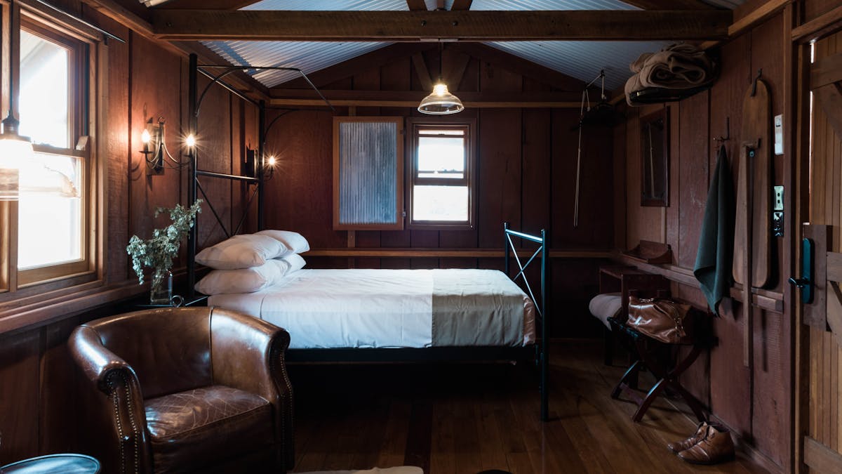 Stay in our rustic 4 star Slab Hut accommodation