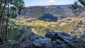 View of mountains, valley and farmland.
