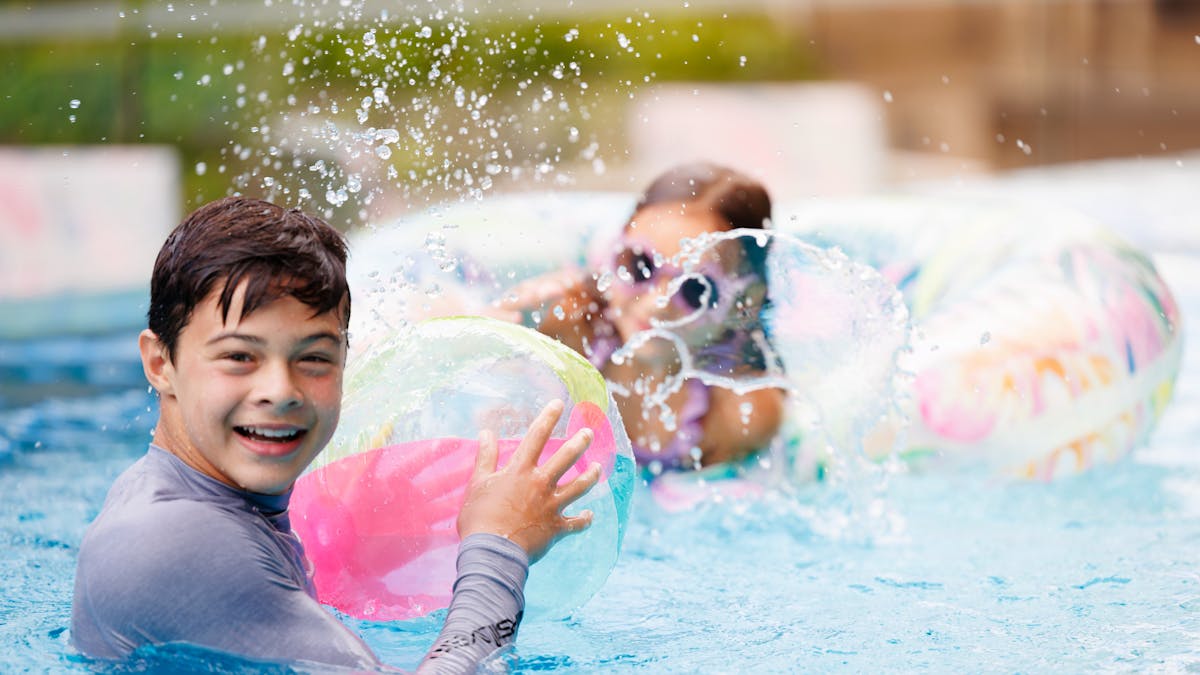 Children playing at the infinity pool at Hyatt Regency Brisbane
