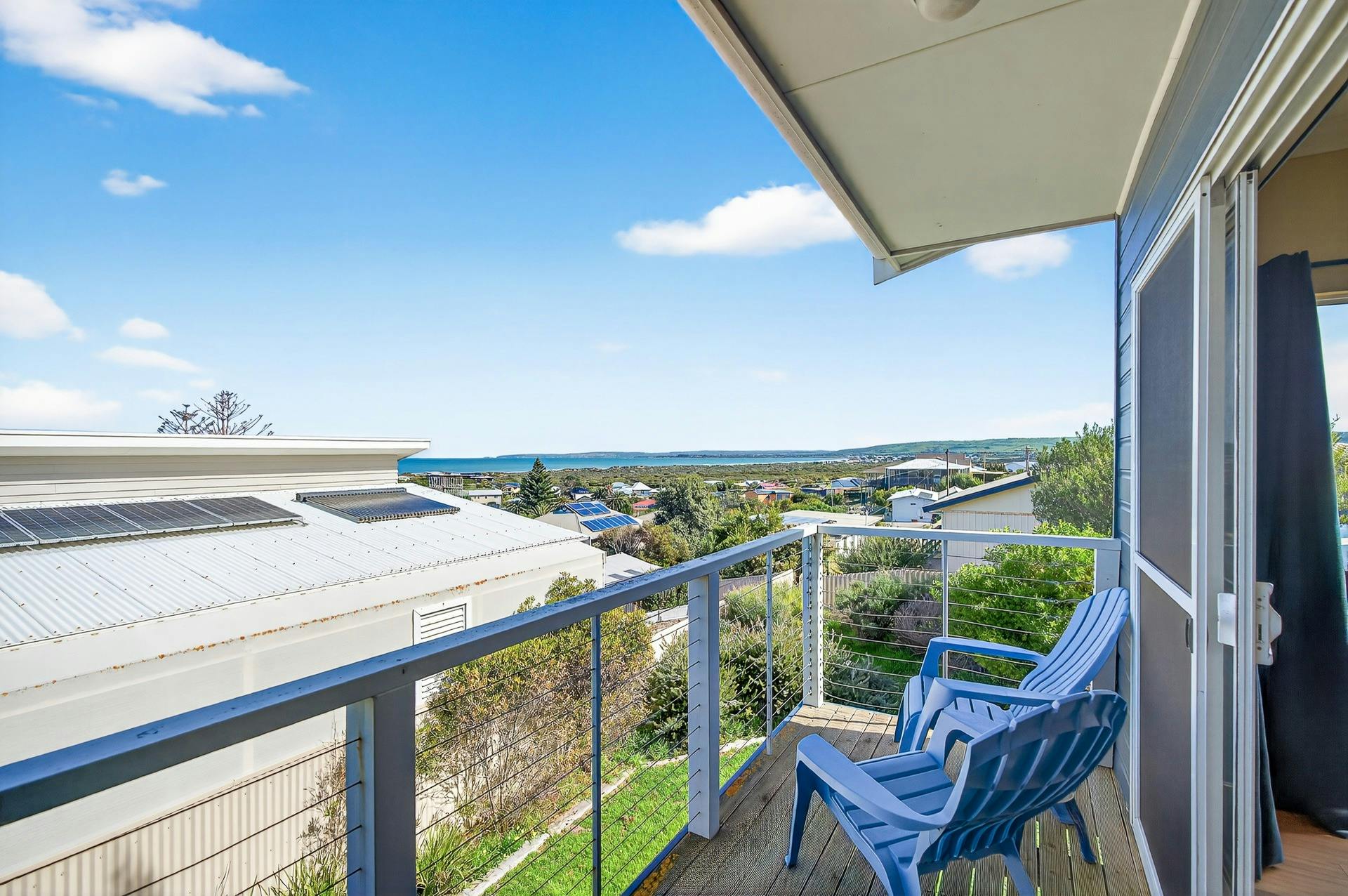 Coffee/wine space with coastal views