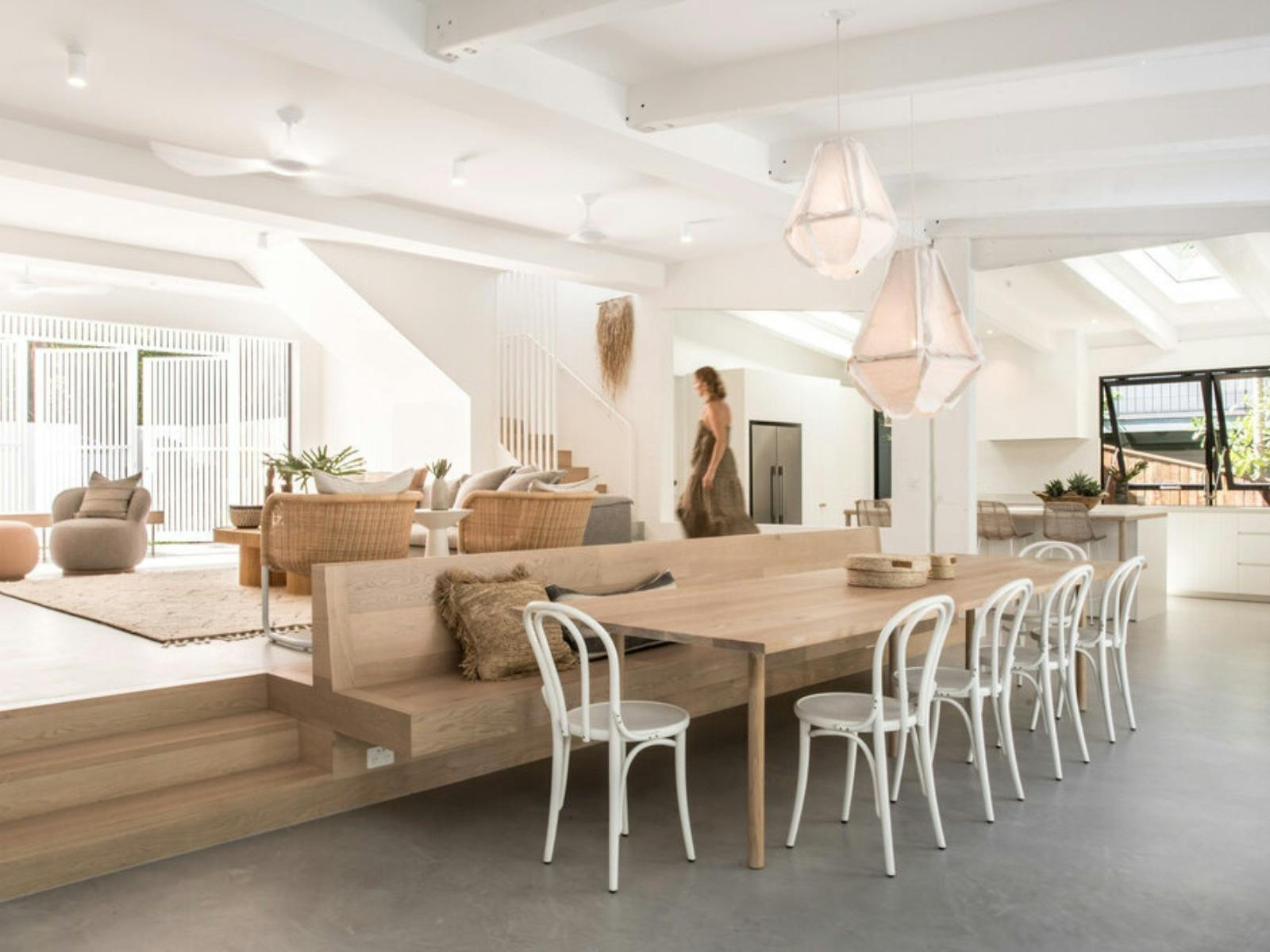 Open-plan living and dining seamlessly extend to a fully covered outdoor terrace and BBQ area