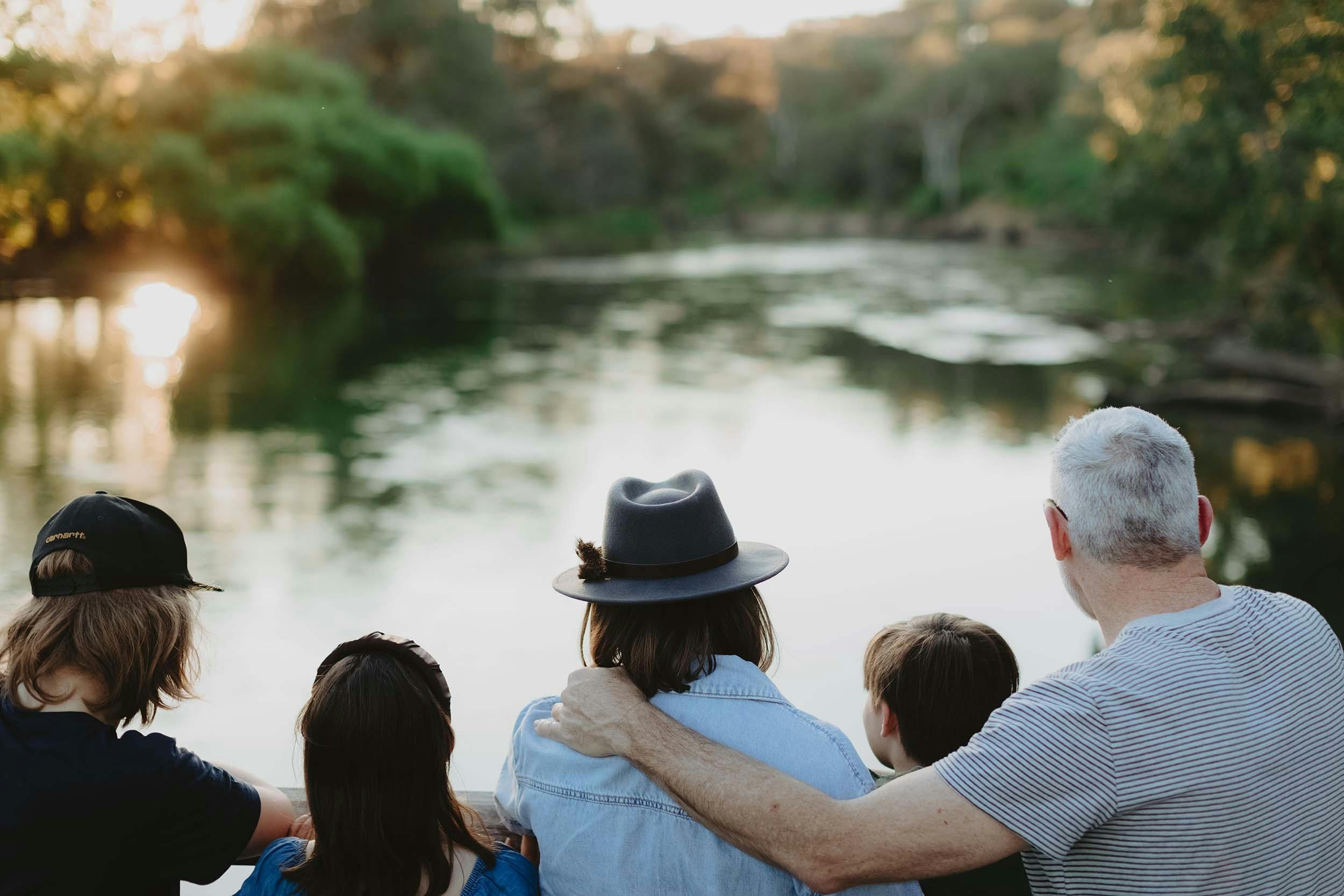 Close up of back of Family Looking at the Murray from the Boardwalk