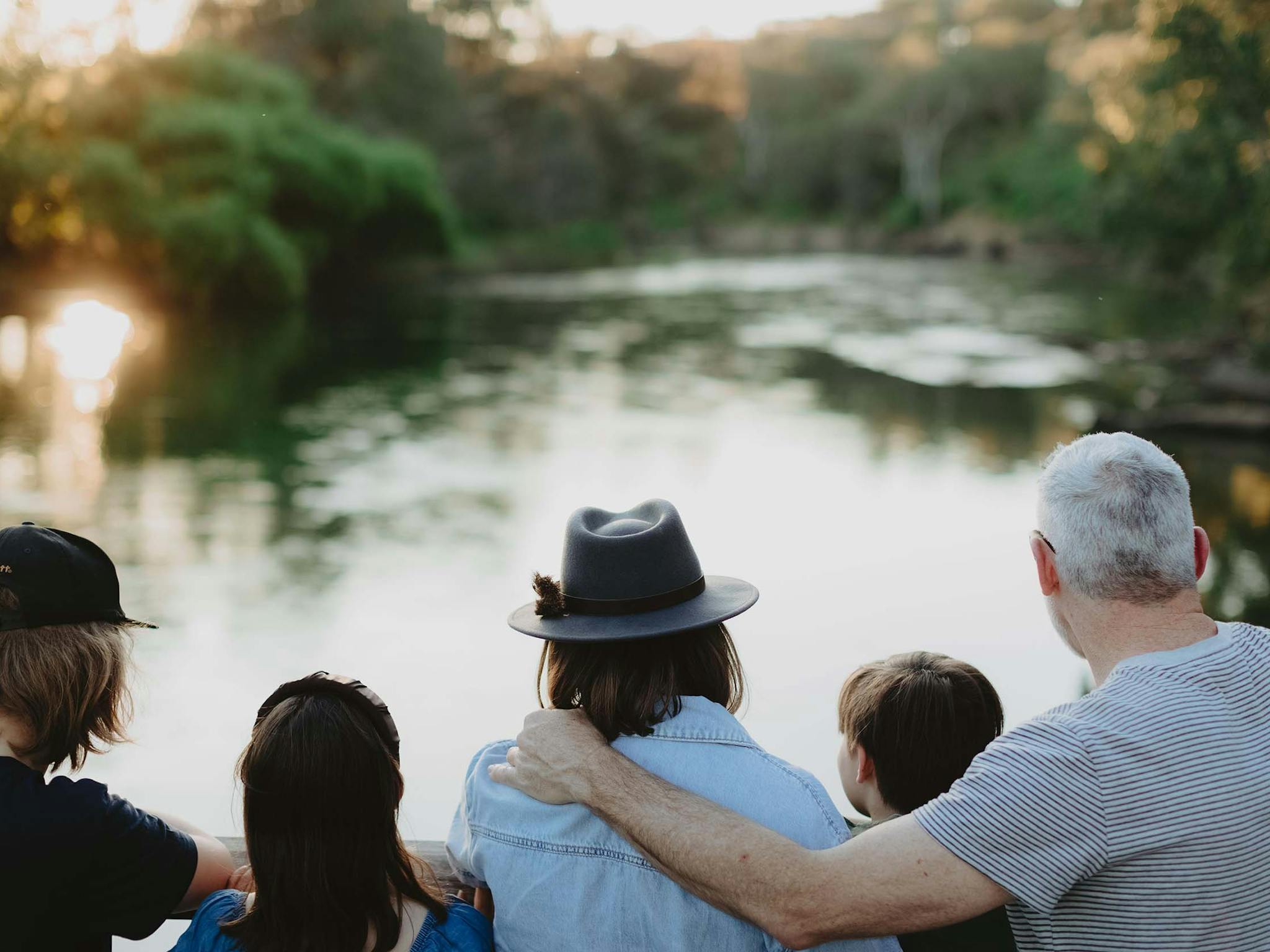 Close up of back of Family Looking at the Murray from the Boardwalk