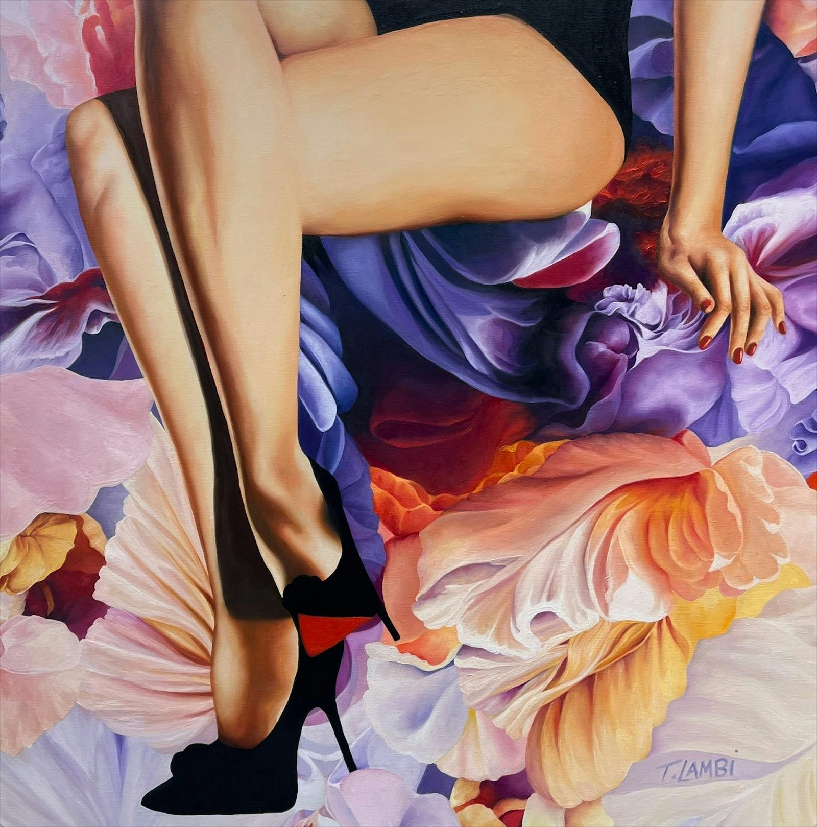 Ladys legs sitting among flowers