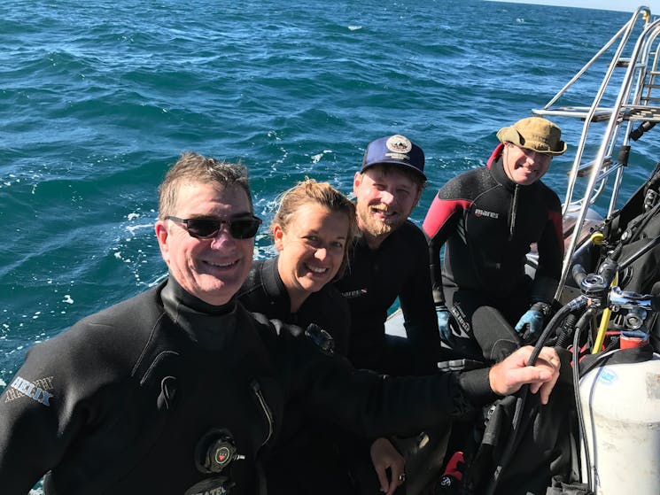 scuba divers at ex HMAS Adelaide