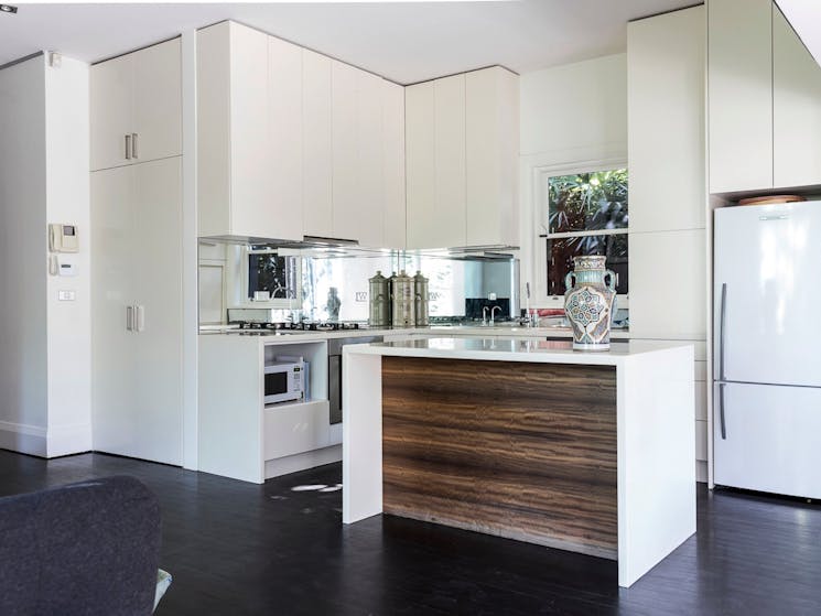 You'll love the fully equipped kitchen with its central island