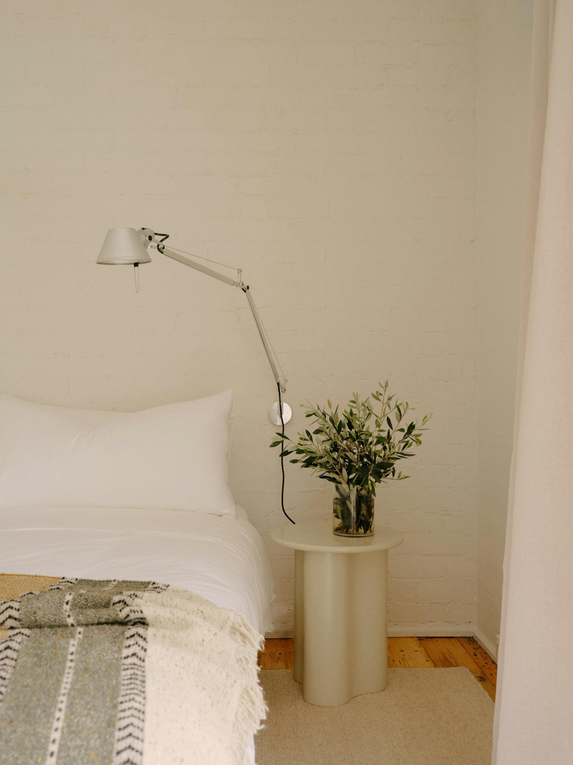 King Suite Bedroom with heating & aircon, water carafes, note pads & pens and garden views