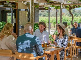 Outdoor summer dining at The Currant Shed