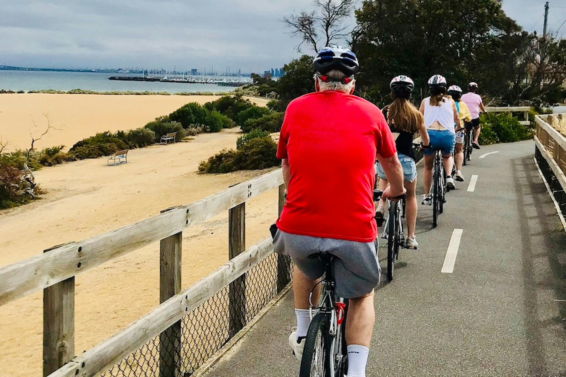 cycling along the bayside cycle track with view of the melbourne skyline