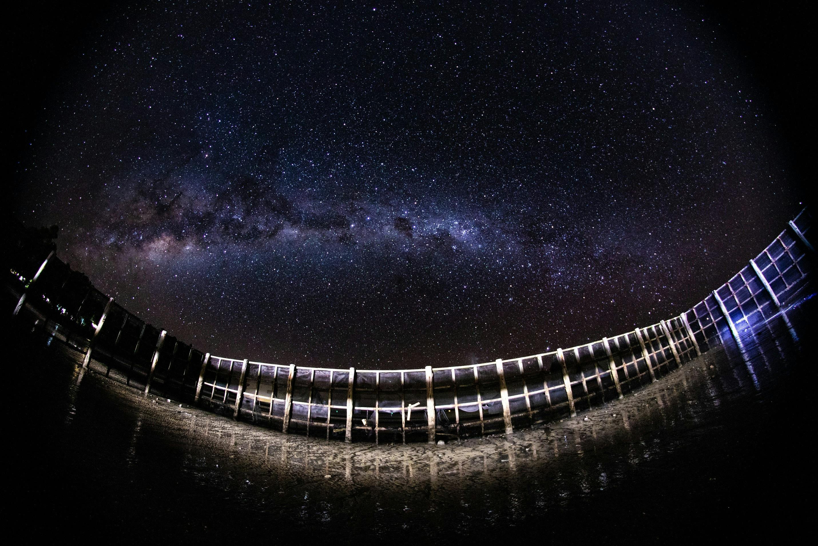 Night photo of swimming enclosure at Wilsons beach lit by the moon