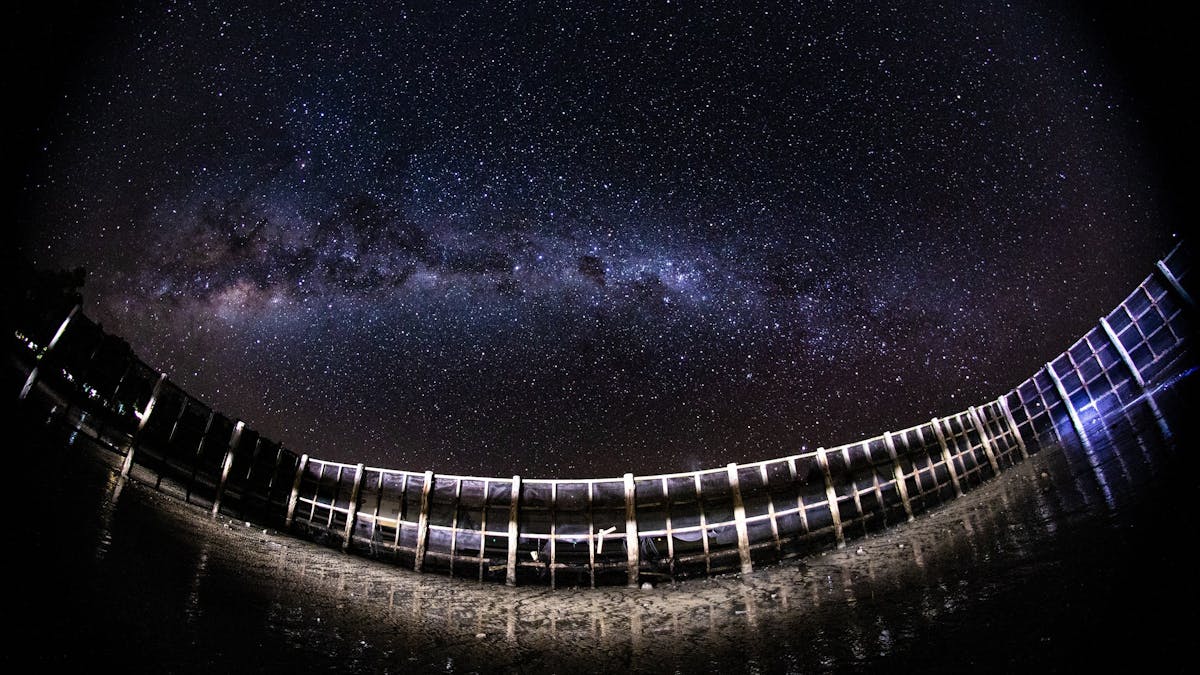 Night photo of swimming enclosure at Wilsons beach lit by the moon
