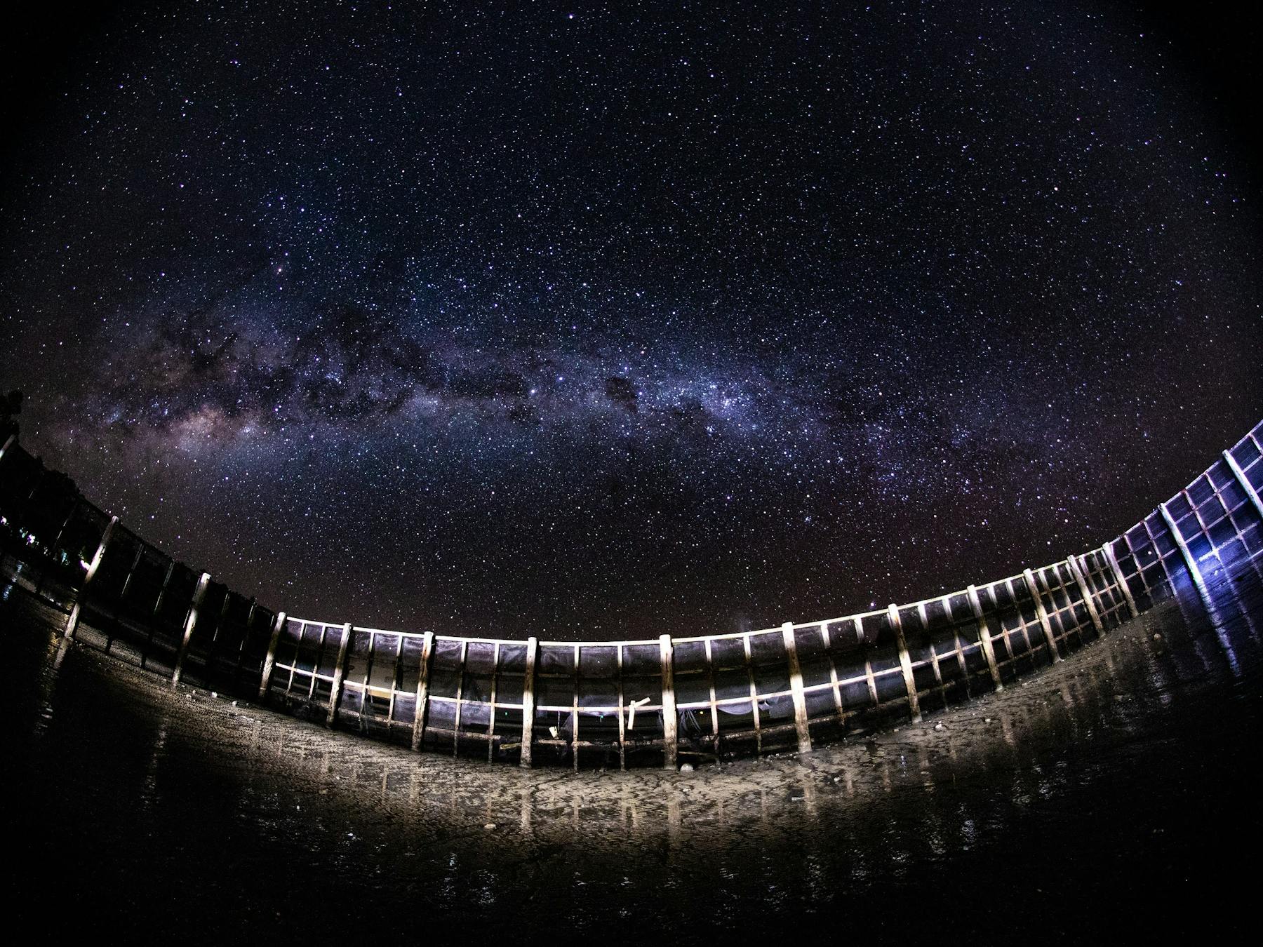 Night photo of swimming enclosure at Wilsons beach lit by the moon