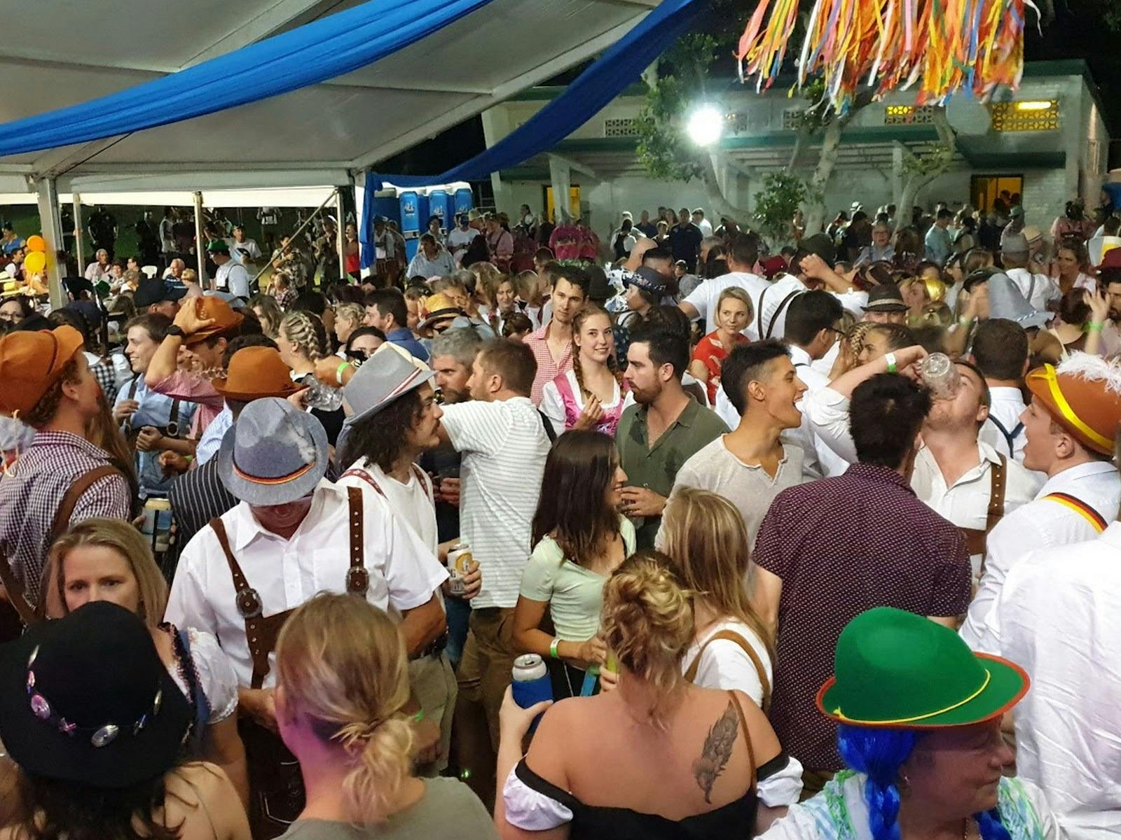 Crowd of happy Oktoberfest patrons