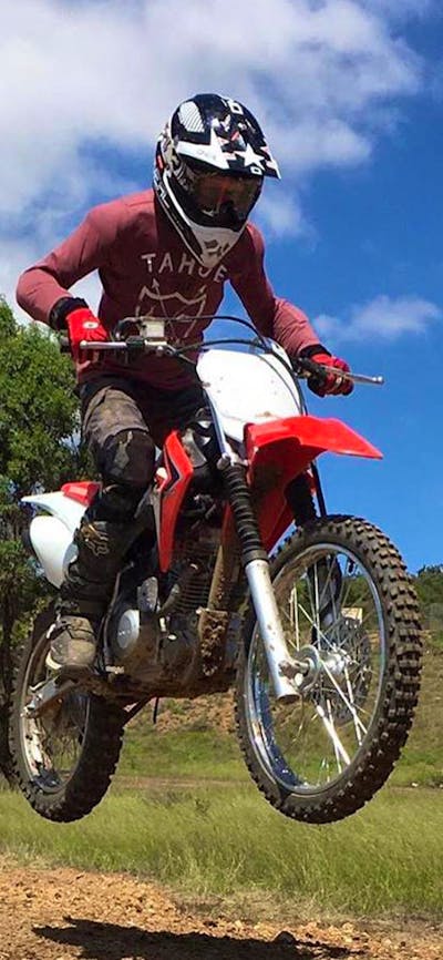 Motorcycle rider taking a jump