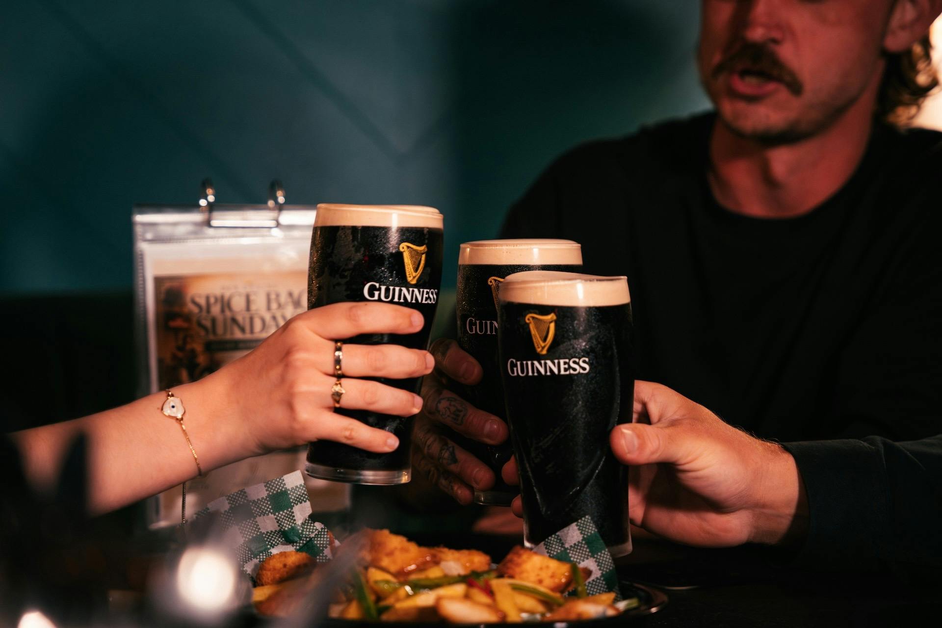 Cheers with Guinness