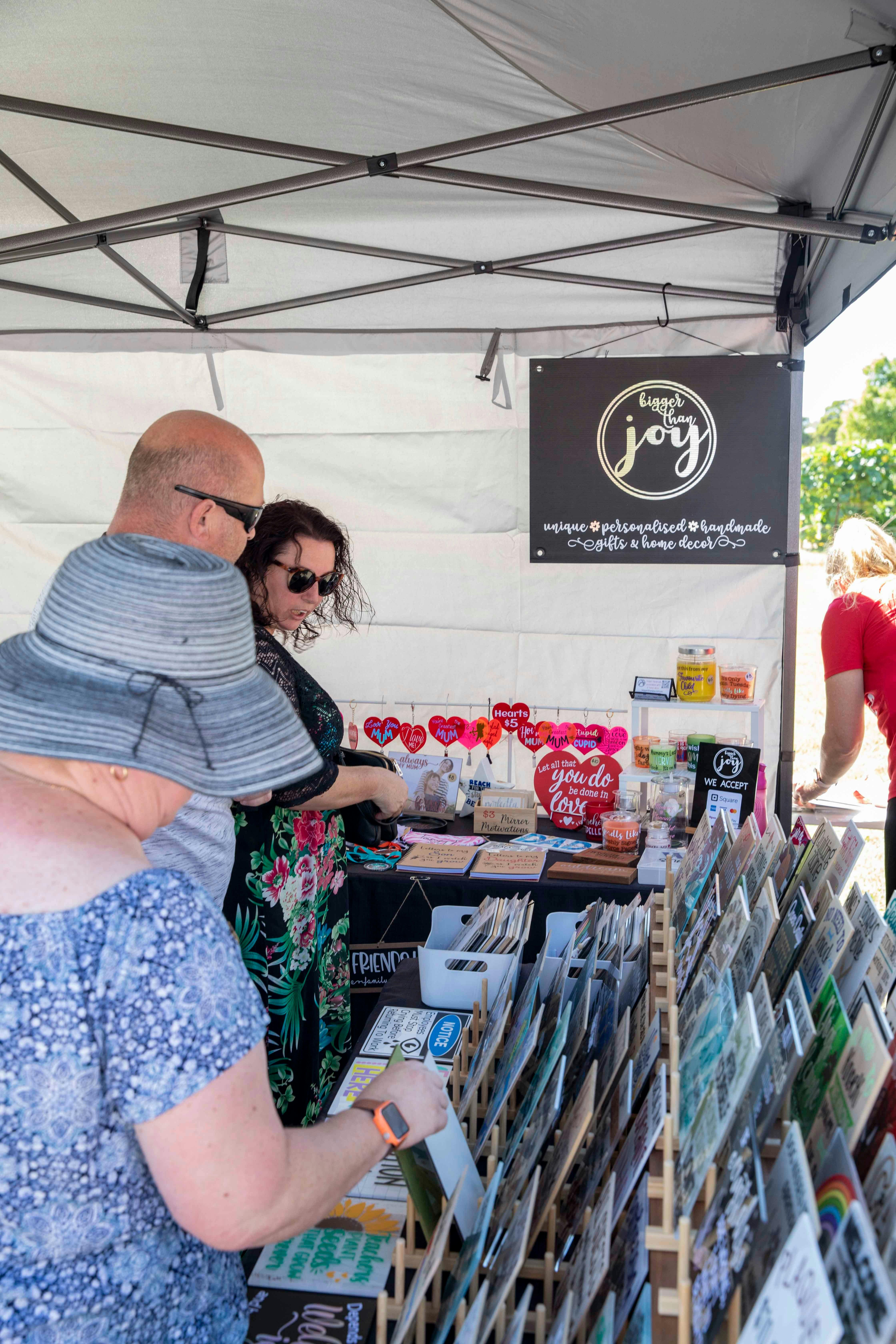 People browsing the local market stalls