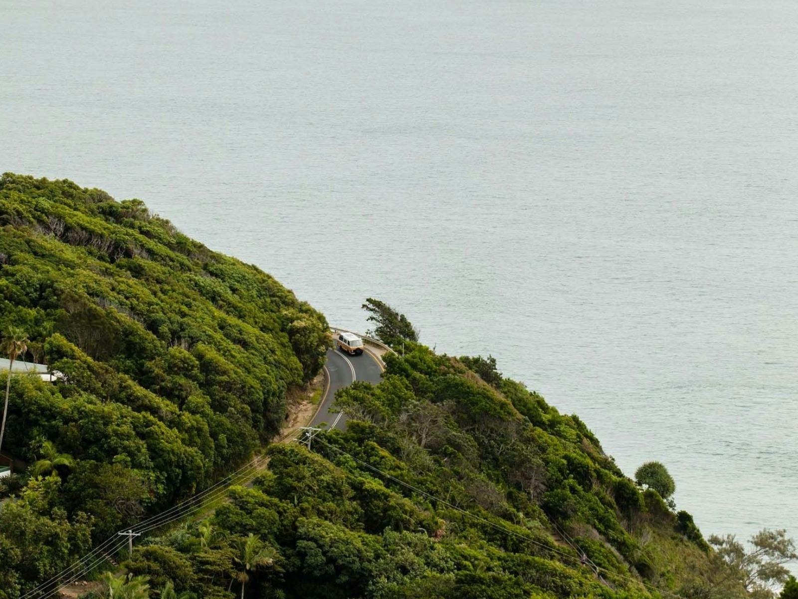 Aerial view of mountains meeting the sea