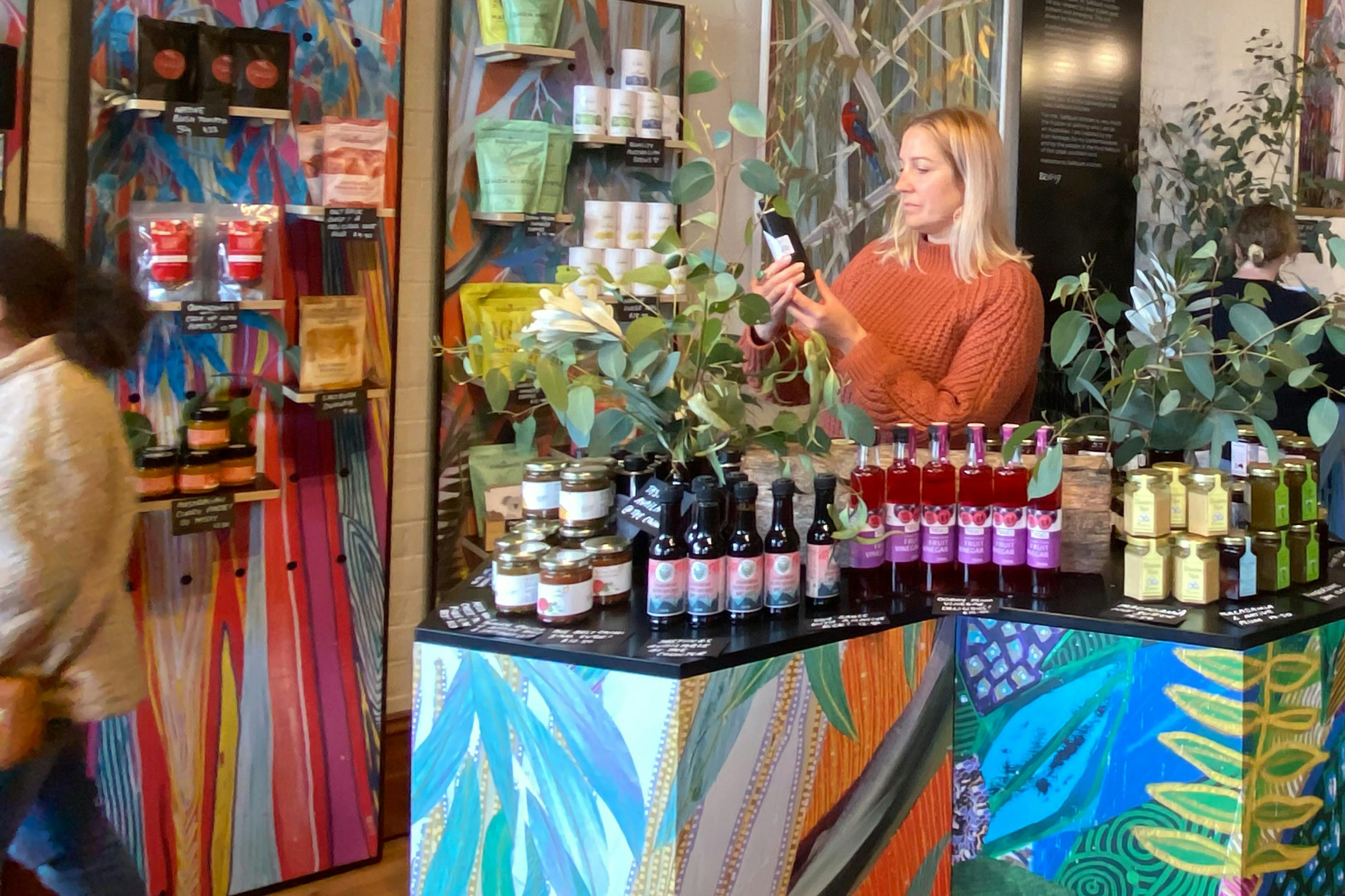 Browsing the bushfood products in store at Saltbush Kitchen