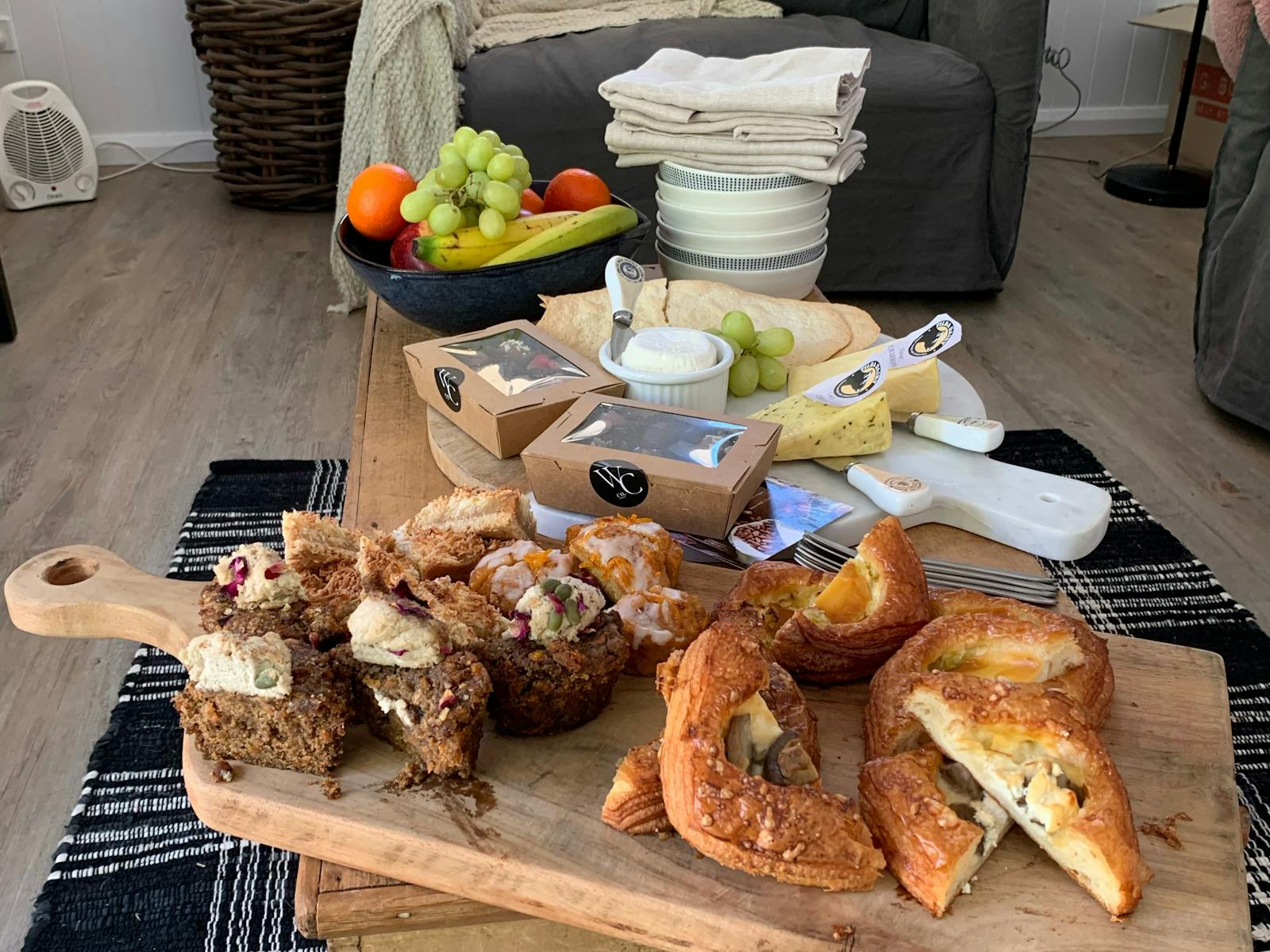 Afternoon tea delights, pastries cheese chocolates and fruit