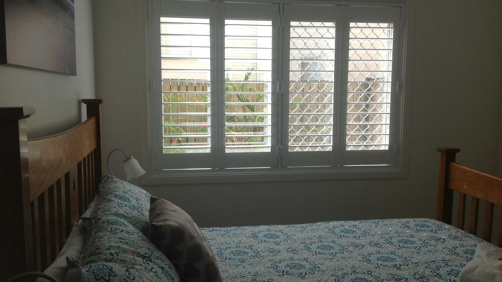 plantation shutters are on the window plantation shutters are on the window